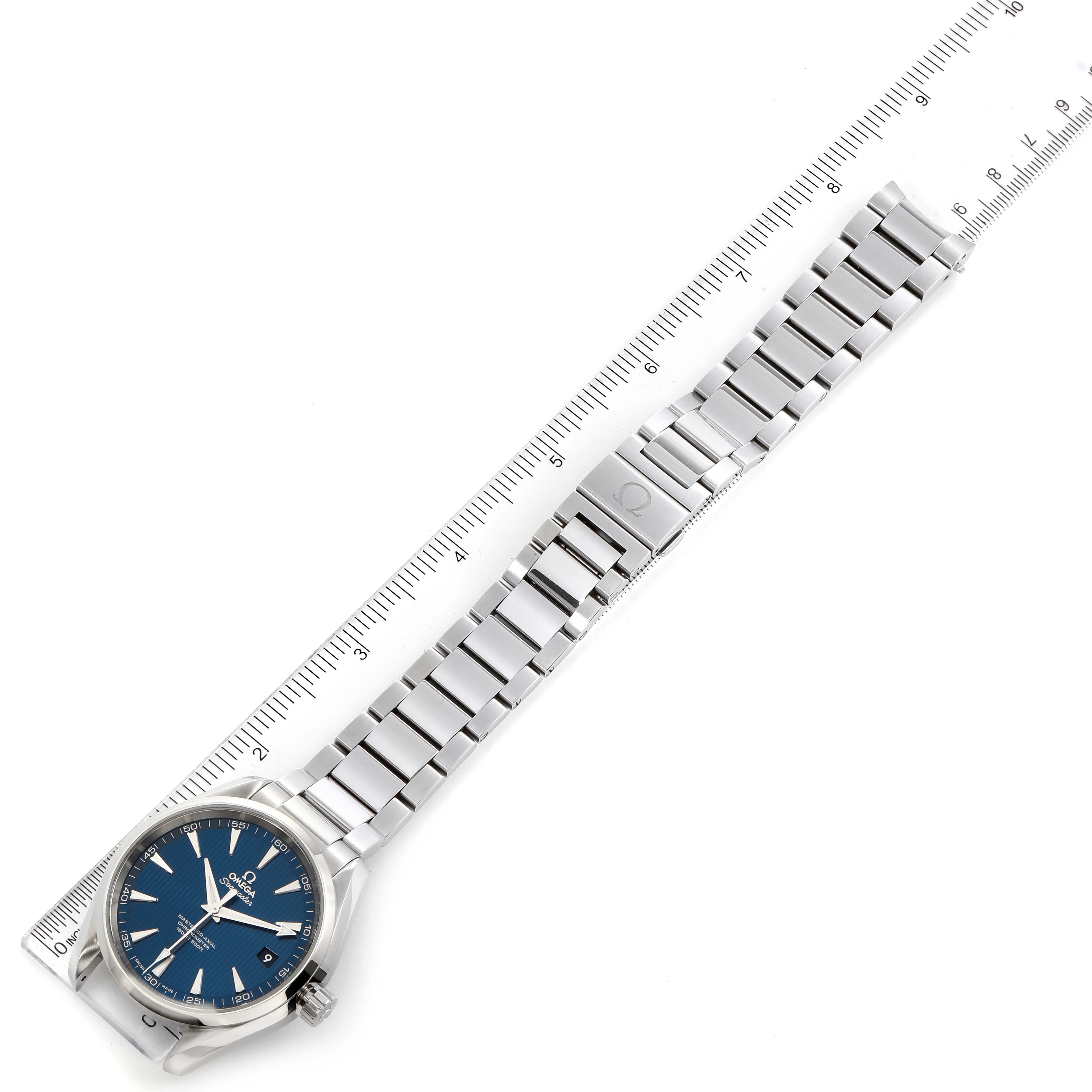 The image shows an Omega Aqua Terra 231.10.42.21.03.003 Men's Stainless Steel Blue Dial 231.10.42.21.03.003 Men's Stainless Steel Blue Dial watch lying flat with a metal bracelet and a ruler for scale.