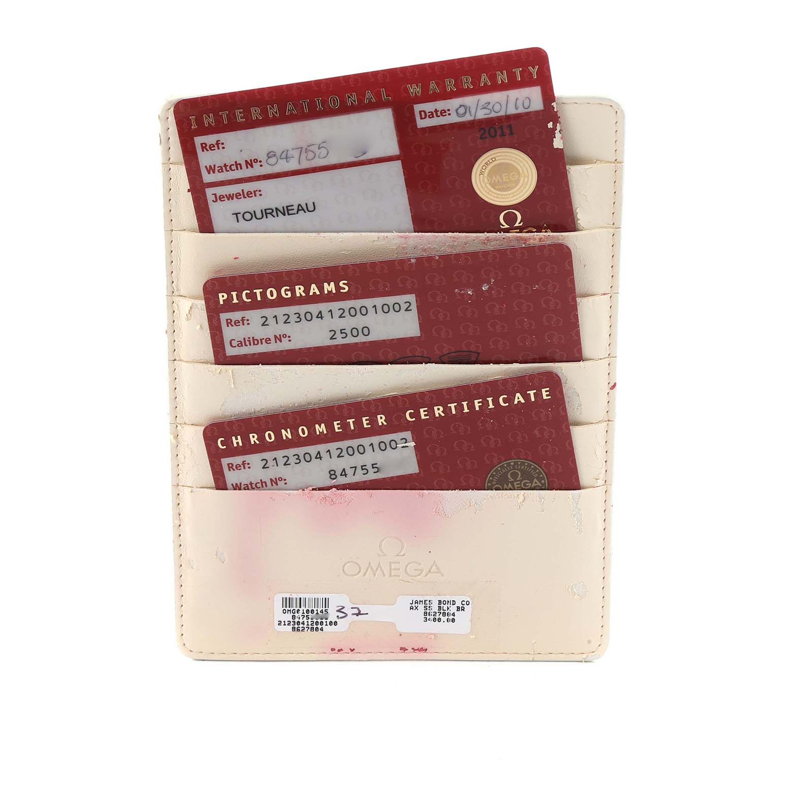 The image shows warranty cards and certificates for an Omega Seamaster 212.30.41.20.01.002 Men
s Stainless Steel Black Dial, arranged in a cardholder.