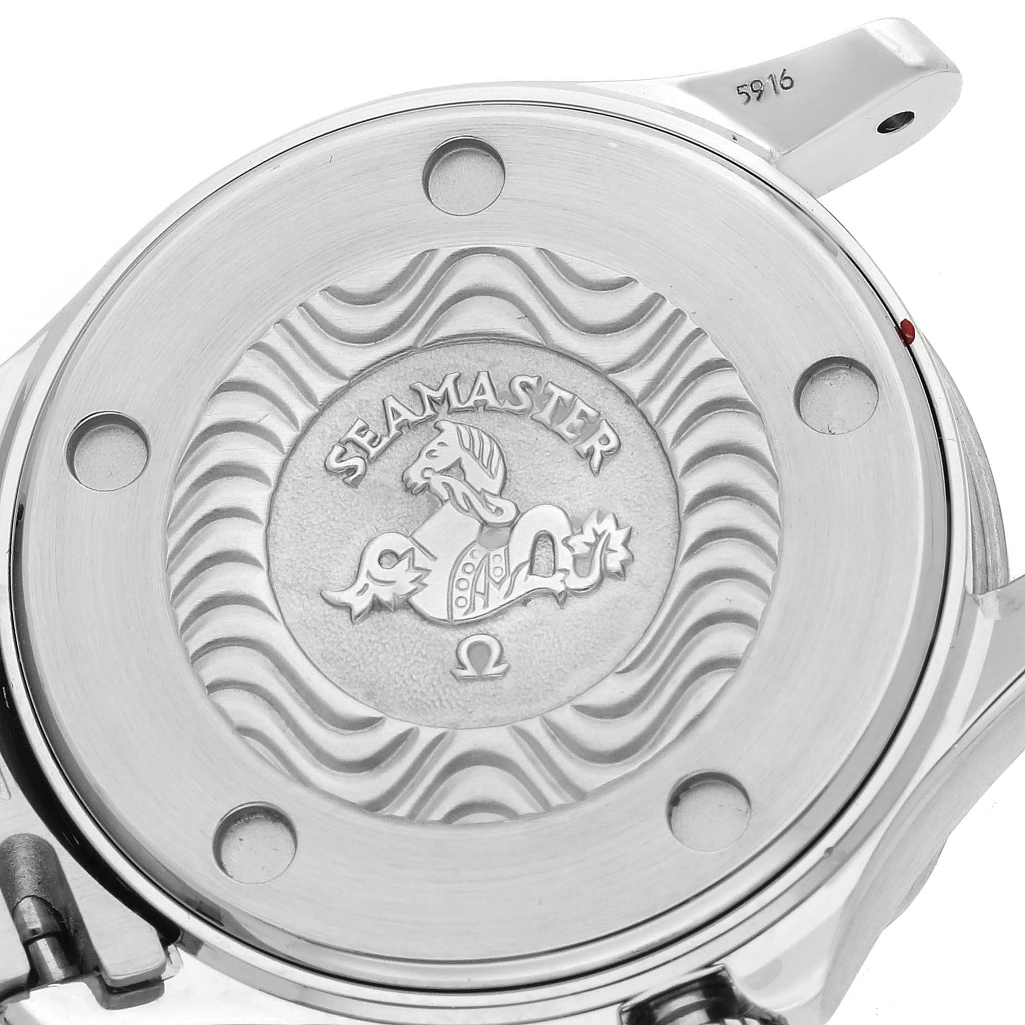 The image shows the back of an Omega 2583.80.00 Women
s Stainless Steel Blue Dial Seamaster Diver 300M 28mm, highlighting the engraved design and branding.