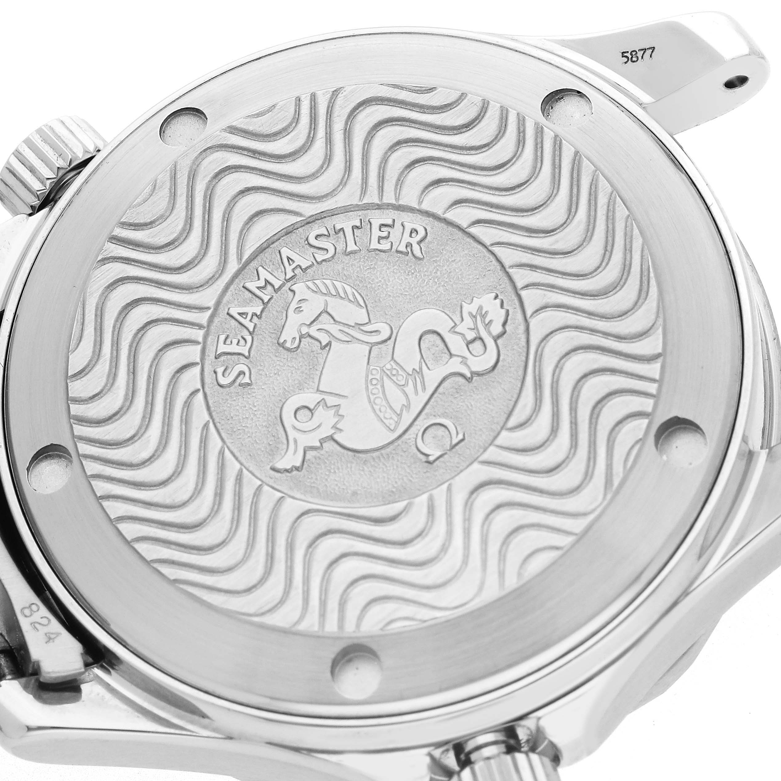 The image shows the back of an Omega Seamaster 2561.80.00 Men
s Stainless Steel Blue Dial watch, featuring engraved wave patterns and the Seamaster logo.