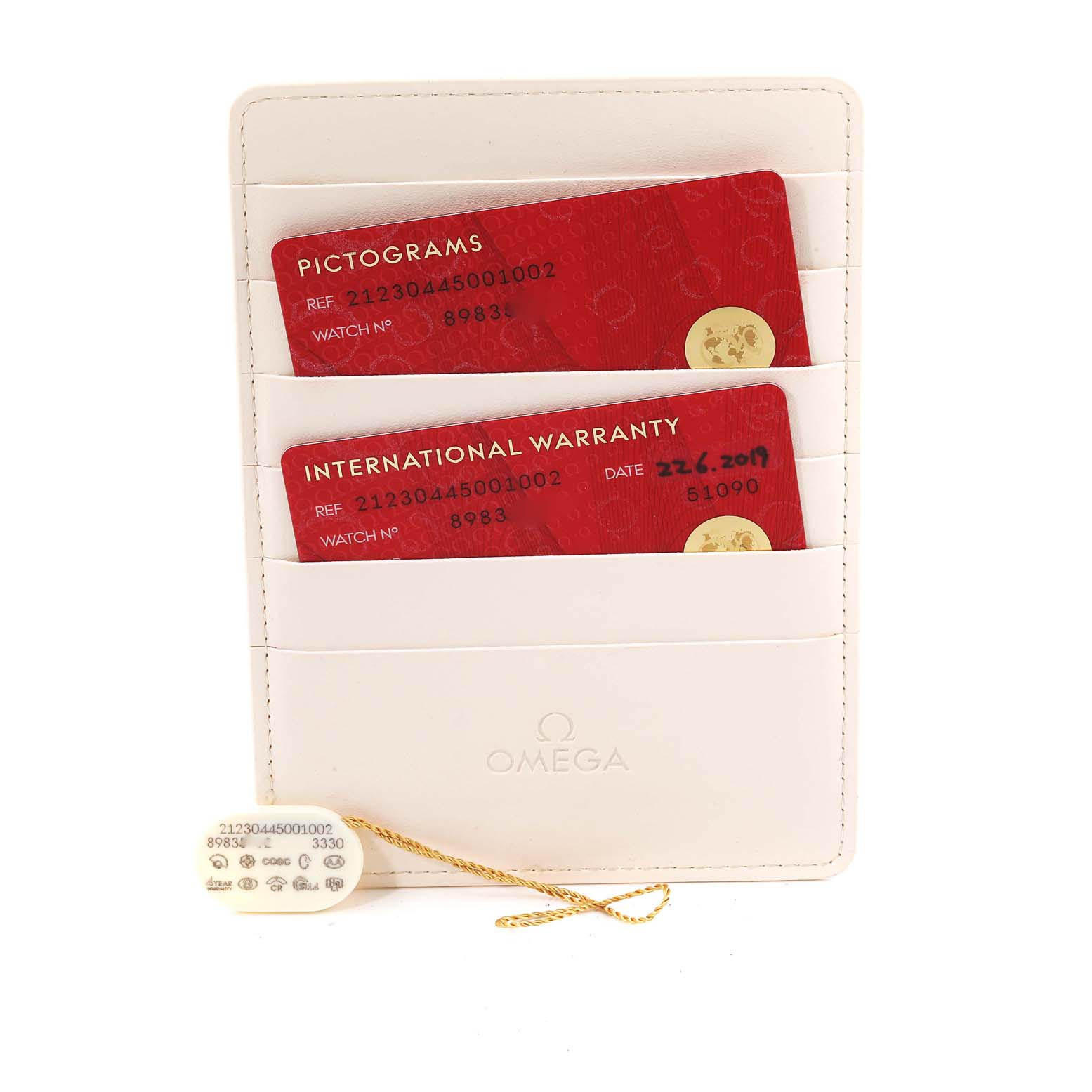 This image shows two red cards for the Omega Seamaster 212.30.44.50.01.002 Men's Stainless Steel Black Dial 212.30.44.50.01.002 Men's Stainless Steel Black Dial, labeled "PICTOGRAMS" and "INTERNATIONAL WARRANTY," inside a white Omega holder.