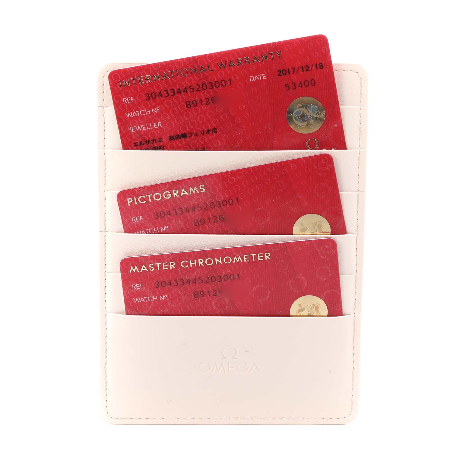 The image shows warranty, pictogram, and chronometer cards for an Omega Speedmaster 304.33.44.52.03.001 Men
s Stainless Steel Blue Dial in a white cardholder.