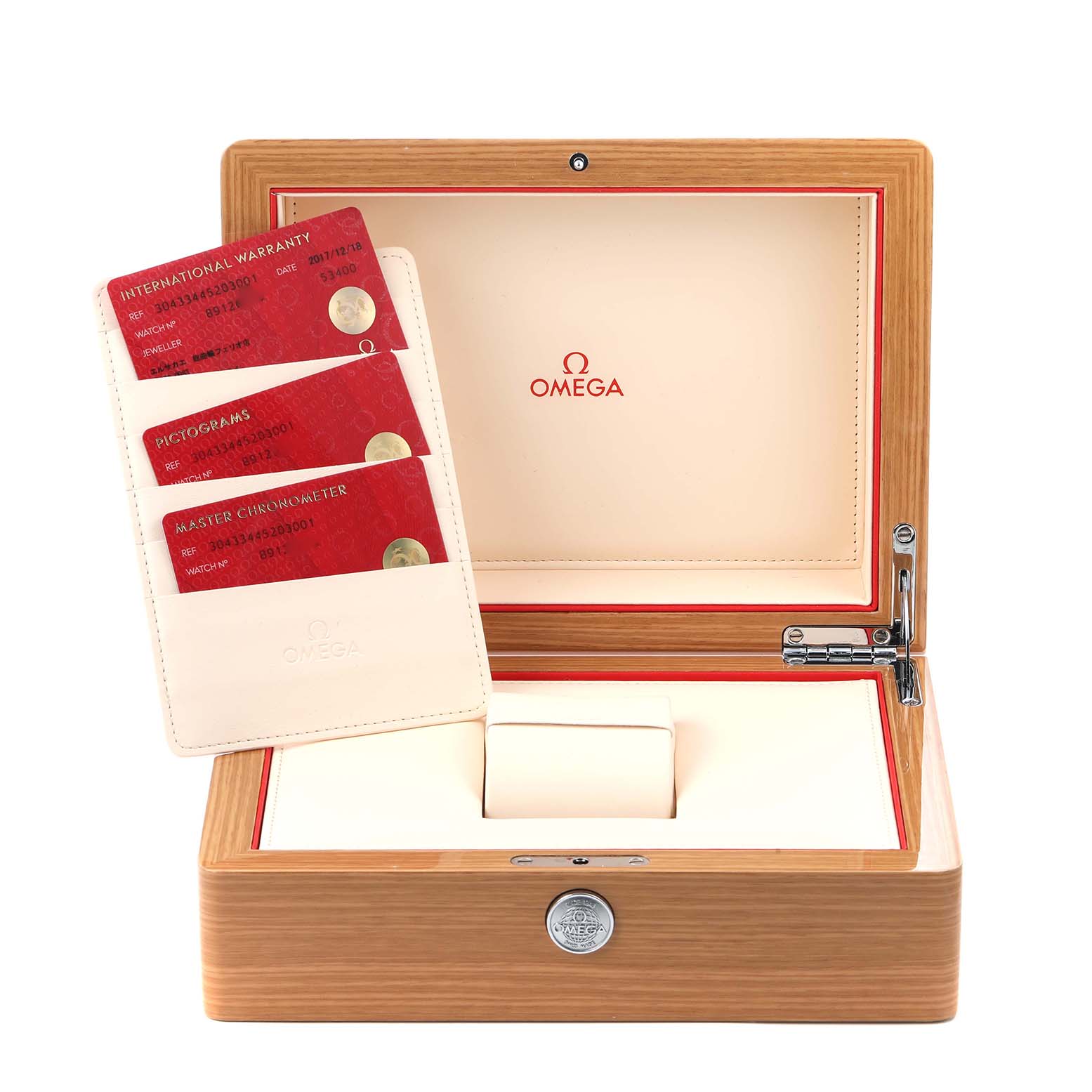 The image shows an open Omega Speedmaster 304.33.44.52.03.001 Men
s Stainless Steel Blue Dial watch box with warranty cards inside.