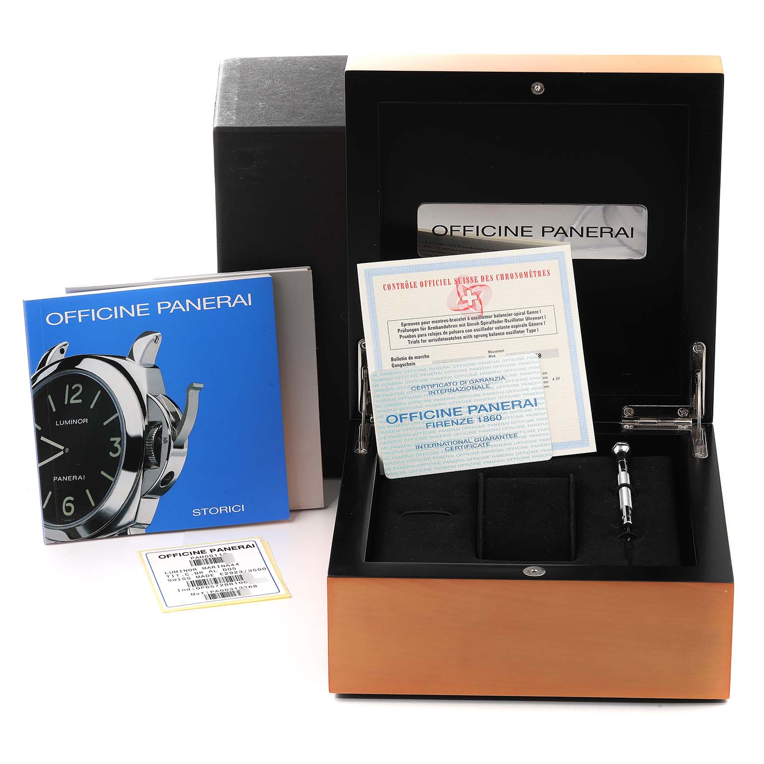 The image shows the packaging, manuals, warranty certificates, and a tool for a Panerai Luminor PAM00118 Men's Titanium Brown Dial PAM00118 Men's Titanium Brown Dial watch, all viewed from above.
