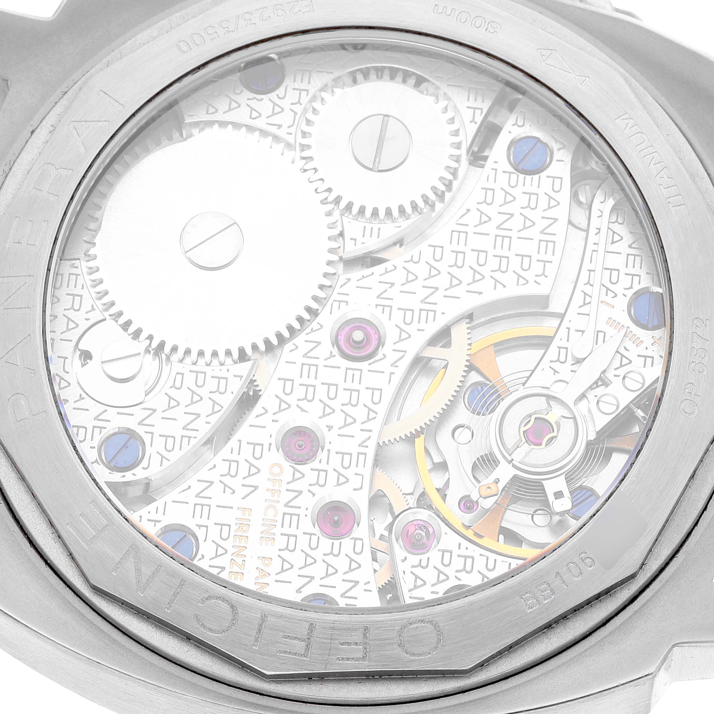 The image shows the back view of a Panerai Luminor PAM00118 Men's Titanium Brown Dial PAM00118 Men's Titanium Brown Dial watch, highlighting the intricate movement and gears.