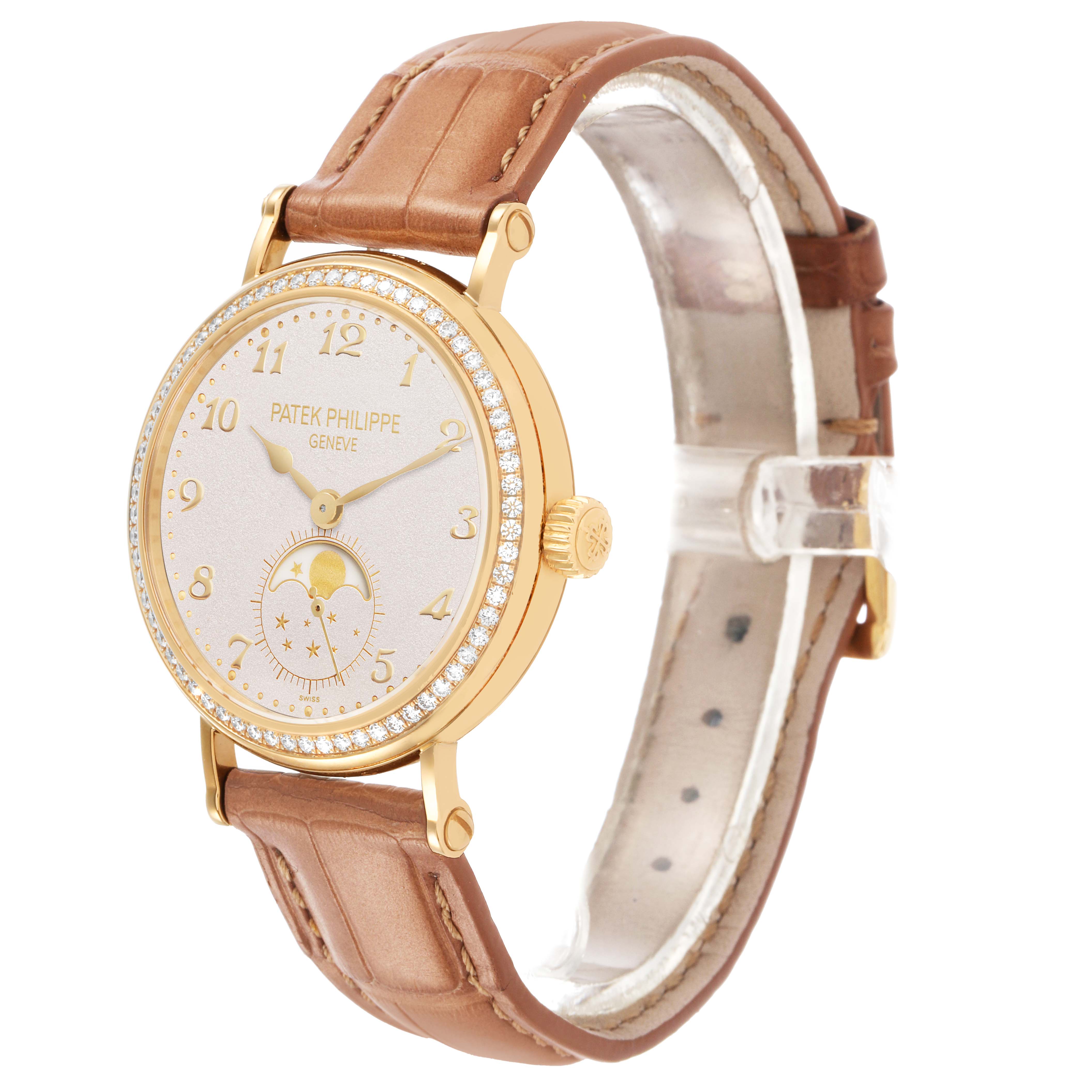 The Patek Philippe Calatrava 7121J-001 Women's Yellow Gold Silver Dial watch is shown at a three-quarter angle, highlighting the face, case, crown, and strap.