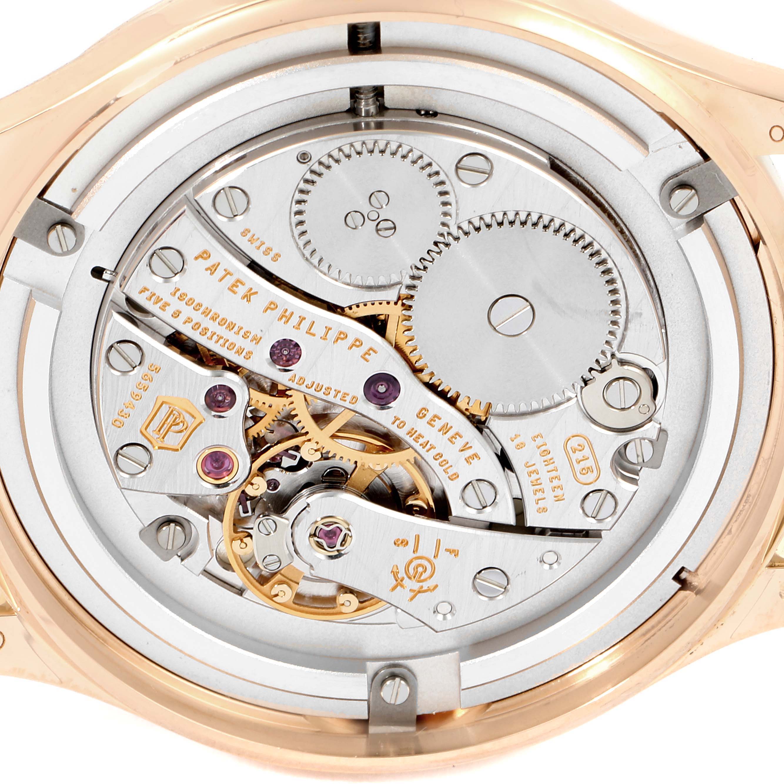 This image shows the intricate movement and mechanical parts of the Patek Philippe Calatrava 4897R-010 Women
s Rose Gold Beige Dial 4897R-010 Women
s Rose Gold Beige Dial watch from the back angle.