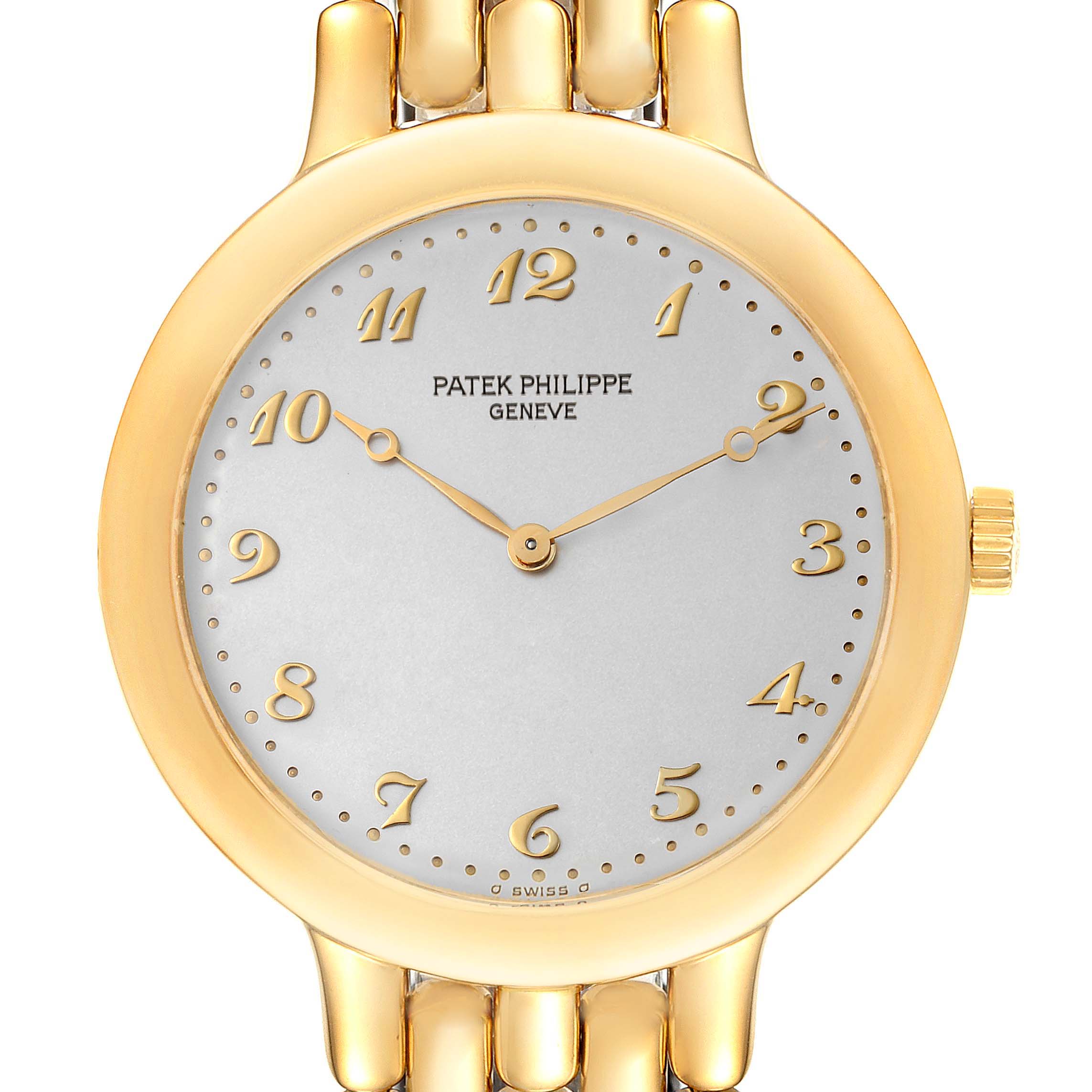 The image shows a close-up of the Patek Philippe Calatrava 3915J Men's Yellow Gold Silver Dial 3915J Men's Yellow Gold Silver Dial watch's face, bezel, and crown from a top-down angle.