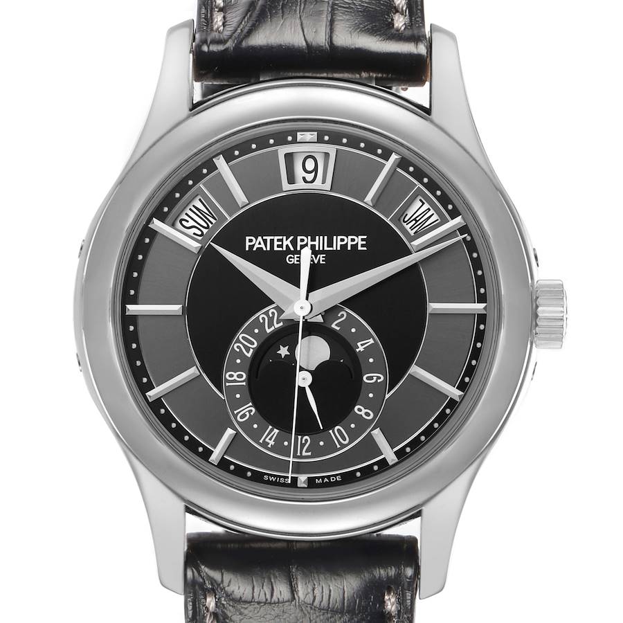 The image shows a frontal view of a Patek Philippe Complications 5205 Men's White Gold Black Dial watch, highlighting the dial, case, and strap.