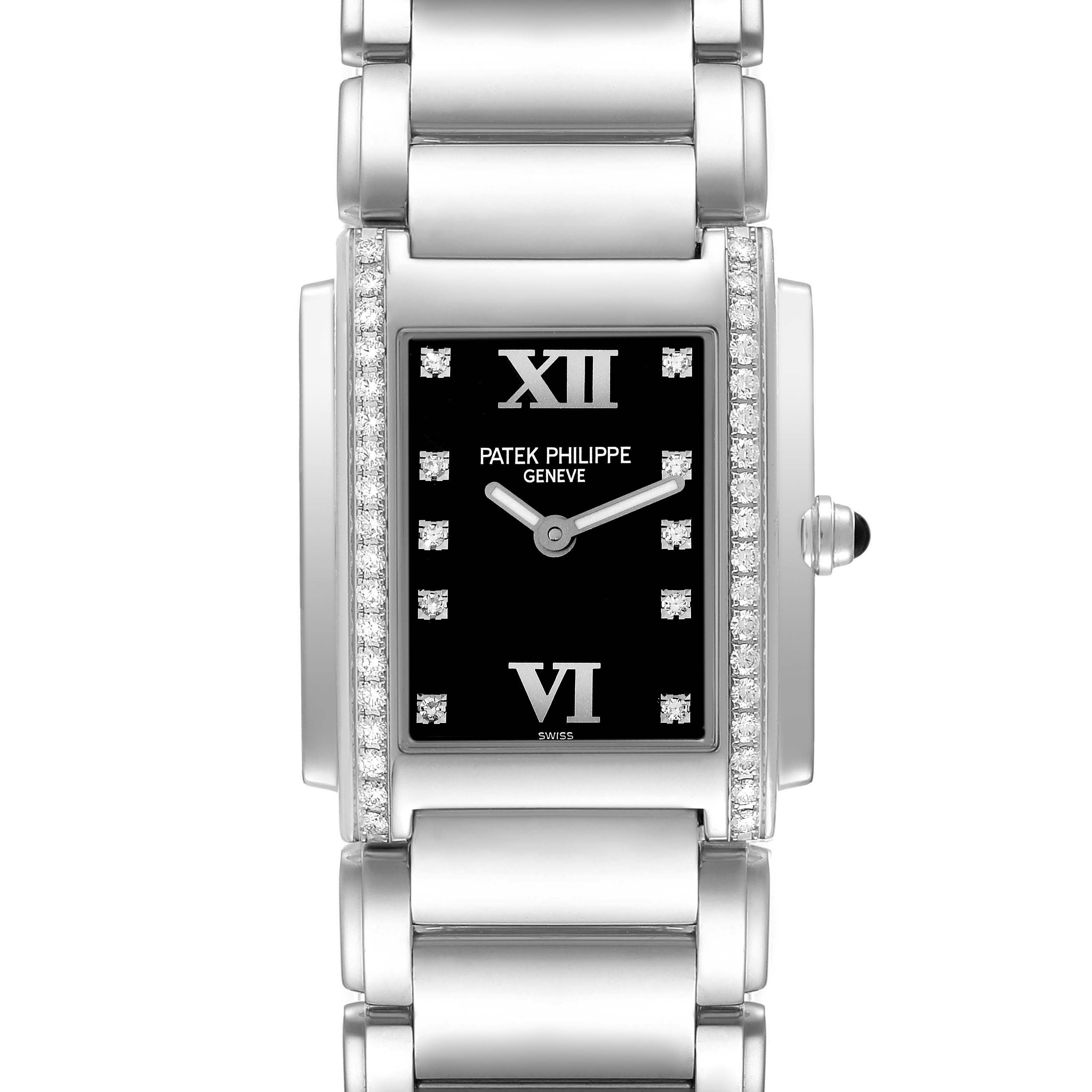 The image shows a front view of the Patek Philippe Twenty-4 4910/10 Women's White Gold Black Dial 4910/10 Women's White Gold Black Dial watch, highlighting its black dial, roman numerals, and diamond accents.