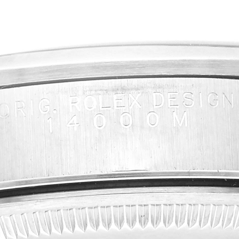 Close-up view of the case side of a Rolex Air-King 14000 Men's Stainless Steel Black Dial 14000 Men's Stainless Steel Black Dial showing model number engraving "14000M" and "ORIG. ROLEX DESIGN."
