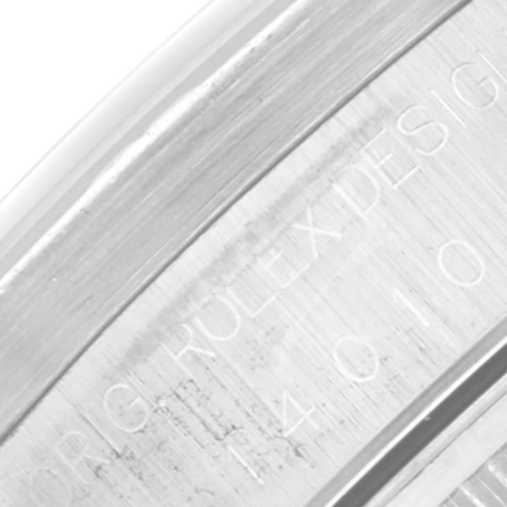 This image shows the engraved case back edge of a Rolex Air-King 14010 Men's Stainless Steel Black Dial 14010 Men's Stainless Steel Black Dial watch, highlighting the model number and "Rolex Design" inscription.