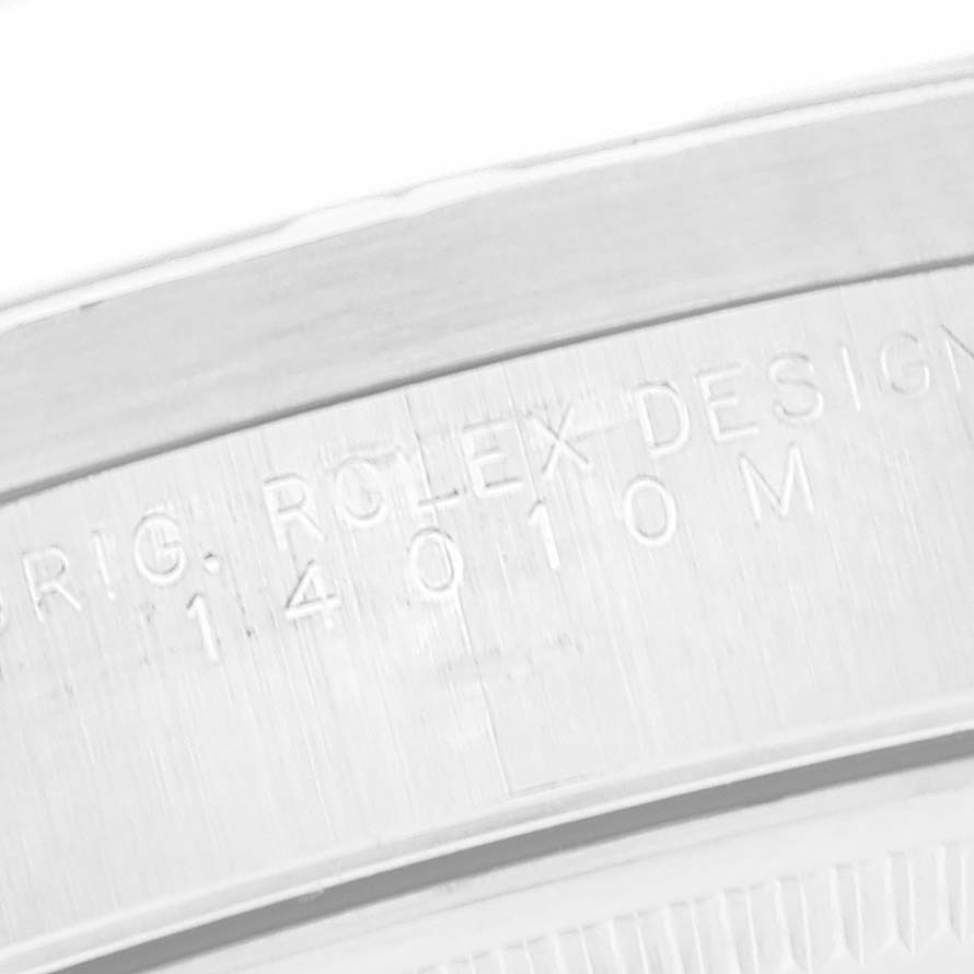 This close-up image shows the engraved model and brand details on the case edge of a Rolex Air-King 14010 Men's Stainless Steel Black Dial 14010 Men's Stainless Steel Black Dial watch.