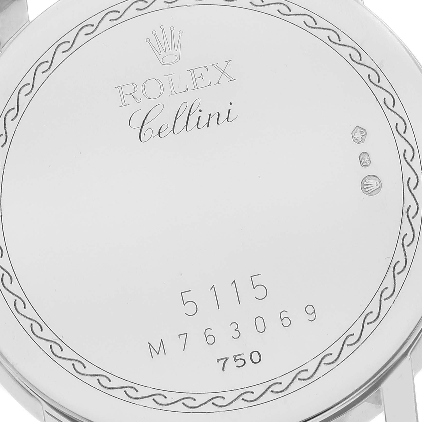 The image shows the back case of a Rolex Cellini 5115 Men's White Gold Silver Dial 5115 Men's White Gold Silver Dial model watch, including its engravings and model number.