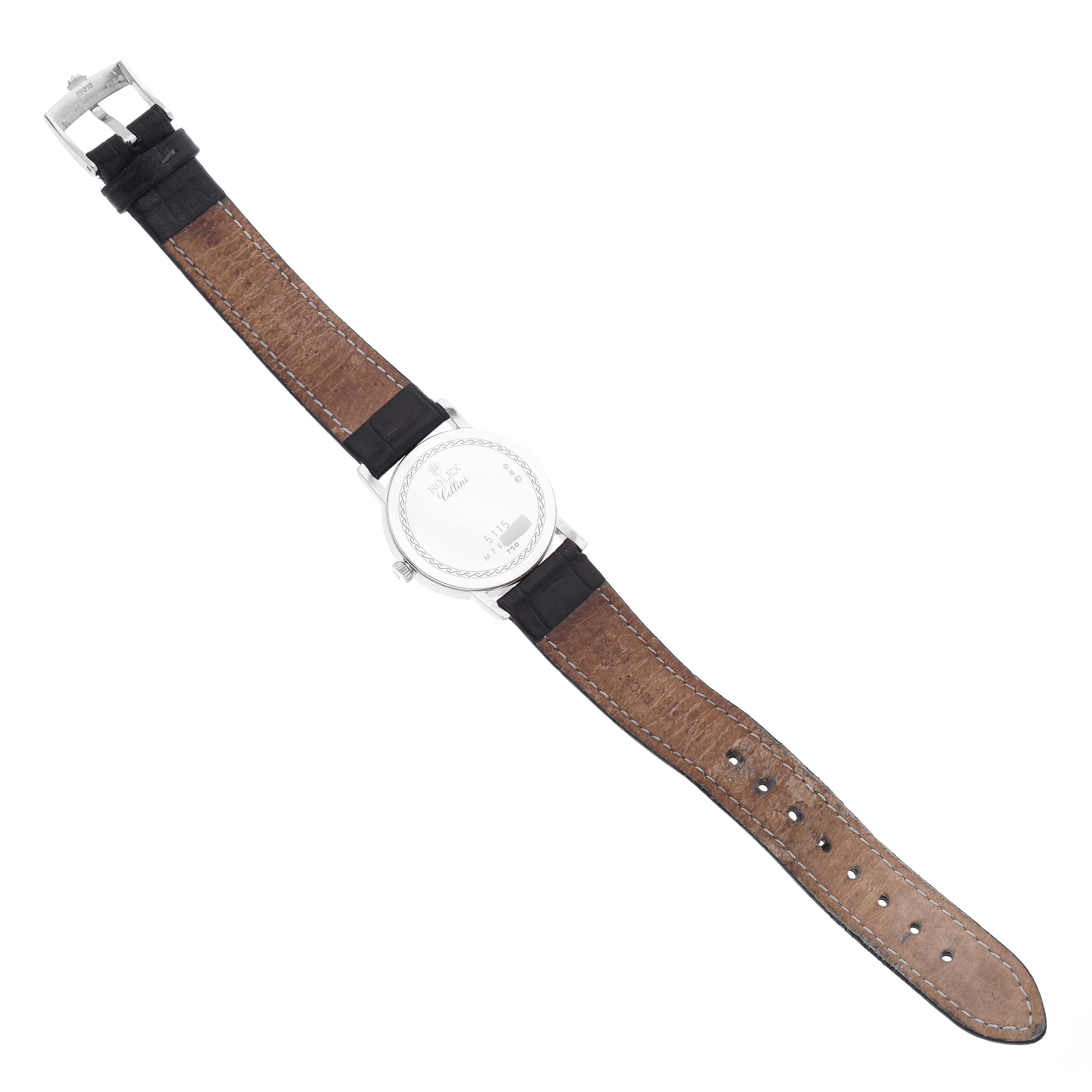 The Rolex Cellini 5115 Men's White Gold Silver Dial 5115 Men's White Gold Silver Dial watch is shown from the back, displaying the leather strap and the clasp.