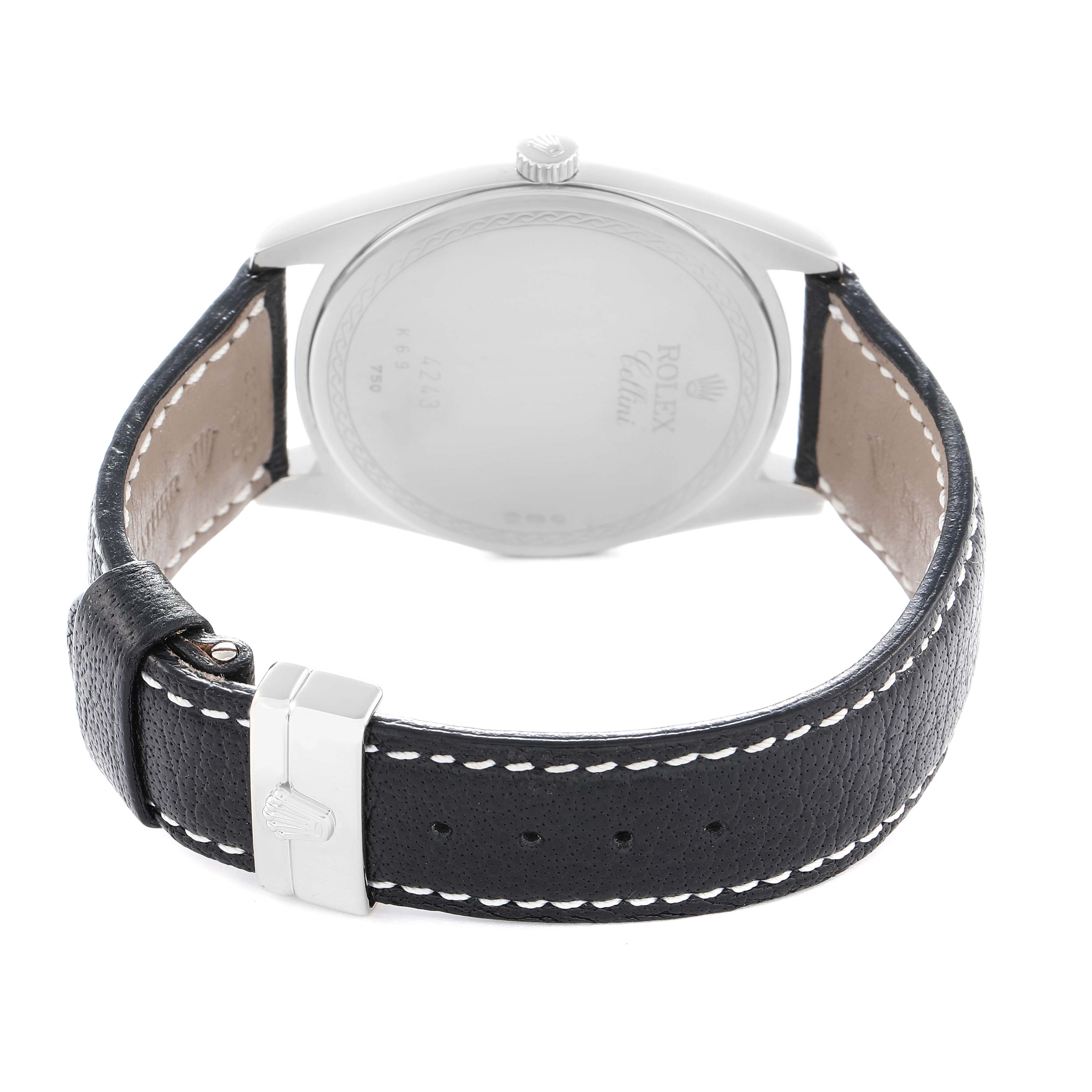 The image shows the back and leather strap of a Rolex Cellini 4243 Men
s White Gold Silver Dial watch from a rear angle.