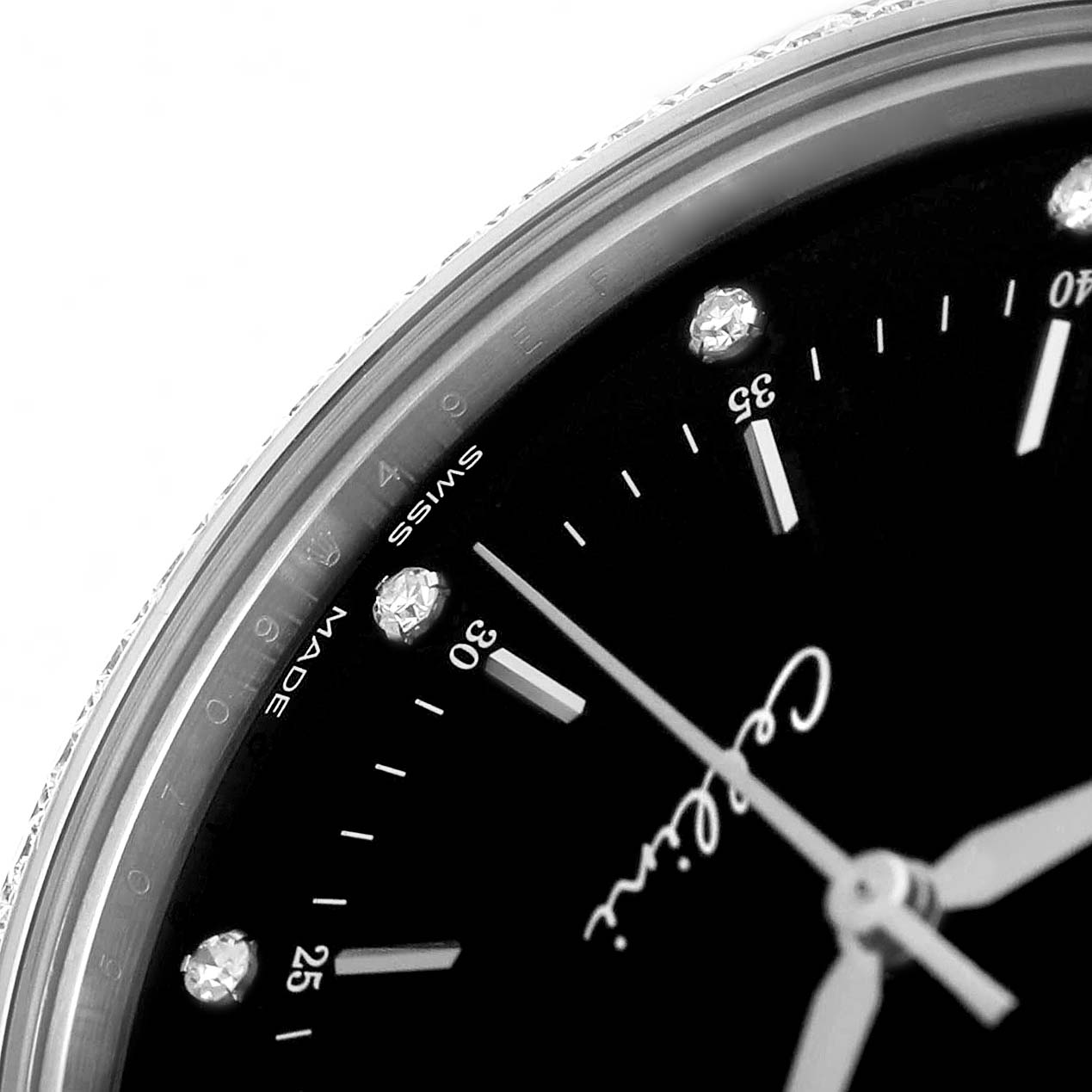 The Rolex Cellini 50709 Men's White Gold Black Dial watch is shown at an angle highlighting part of the dial, including the hands, diamond hour markers, and "Cellini" signature.