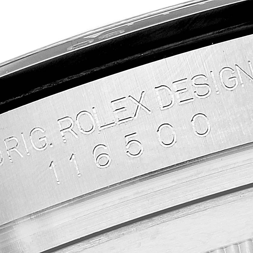 The image shows a close-up of the case with engravings on the Rolex Daytona 116500 Men
s Stainless Steel Black Dial 116500 Men
s Stainless Steel Black Dial watch.