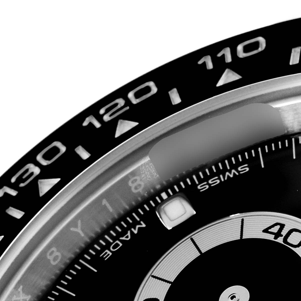 This close-up angle shows the bezel and a portion of the dial of the Rolex Daytona 116500 Men
s Stainless Steel Black Dial 116500 Men
s Stainless Steel Black Dial.