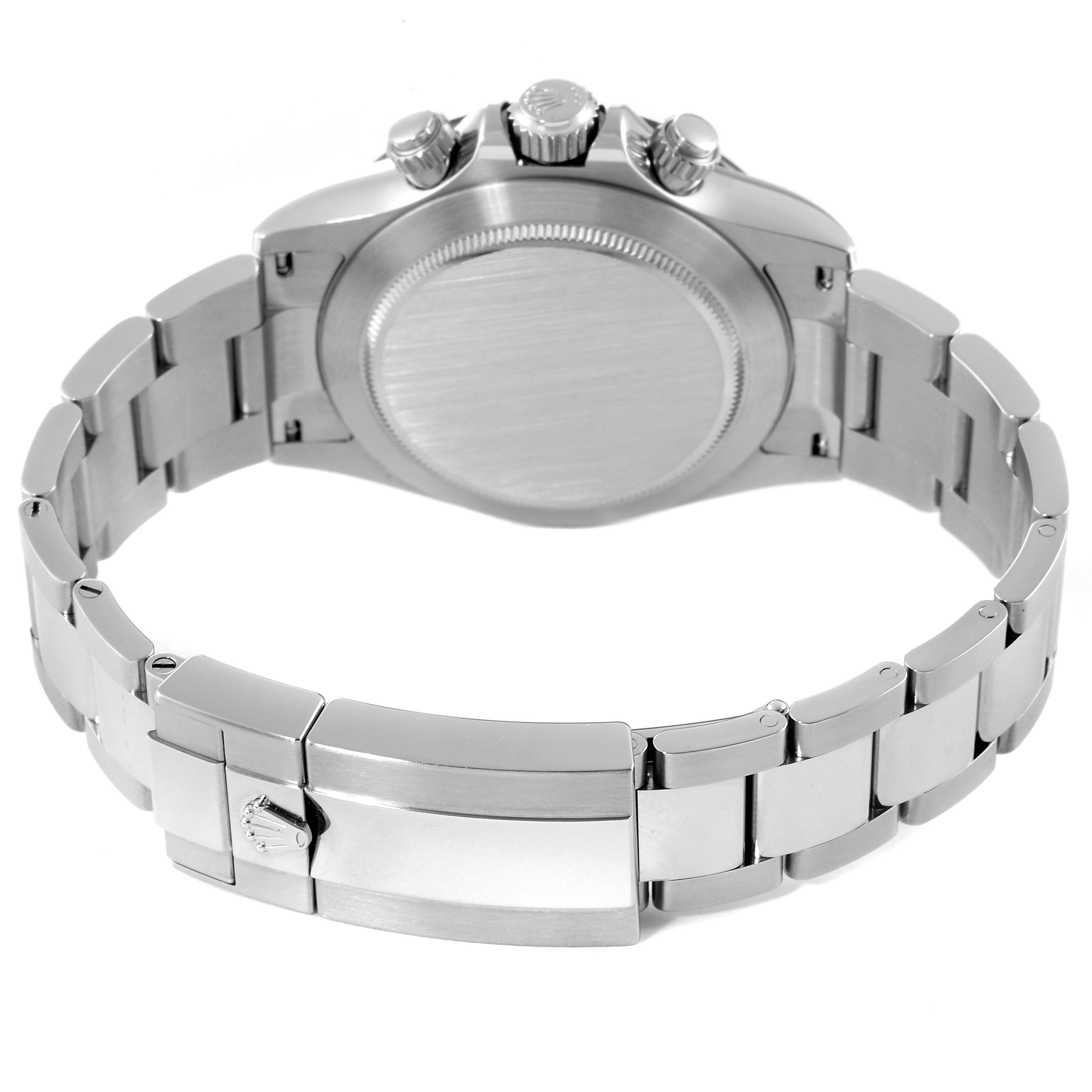 The image shows the back case, crown, pushers, and bracelet of a Rolex Daytona 116500 Men
s Stainless Steel Black Dial 116500 Men
s Stainless Steel Black Dial watch, viewed from the rear angle.