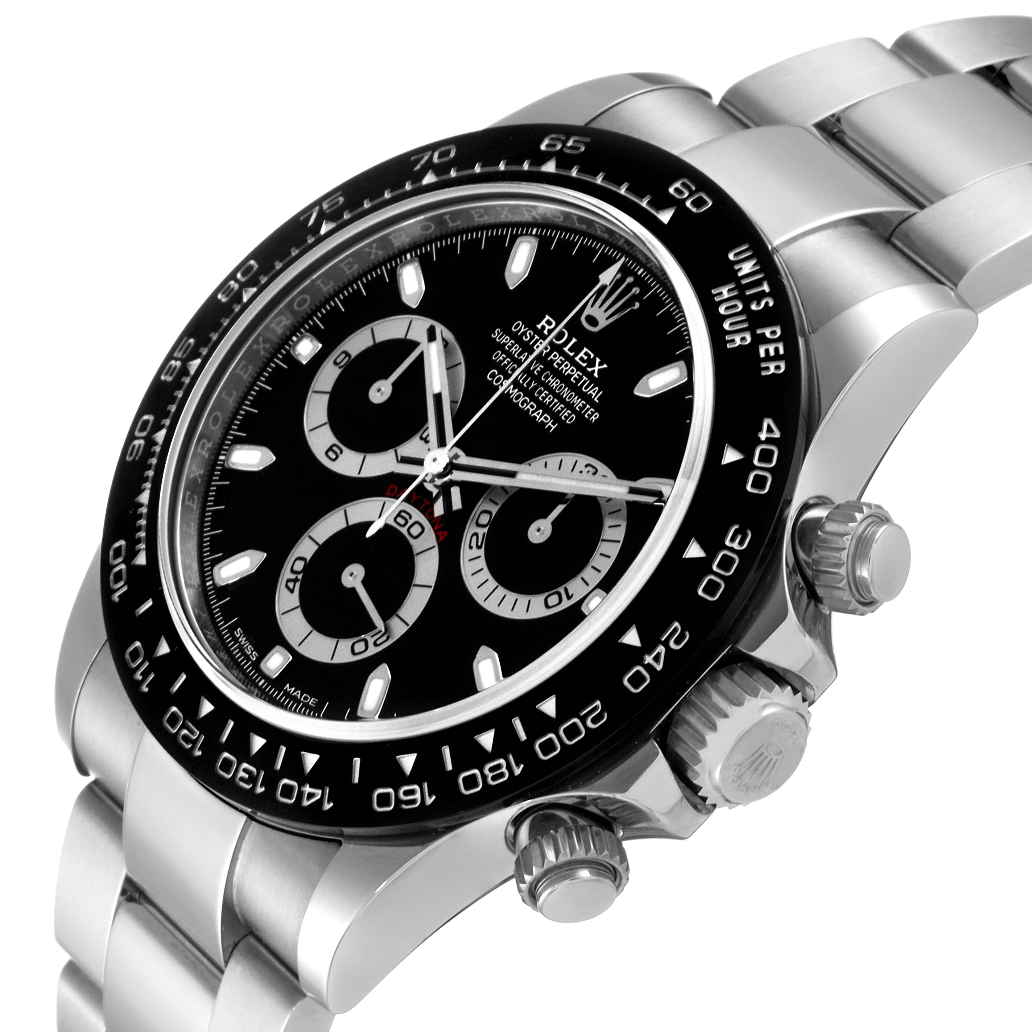 This image shows a close-up angled view of the face, bezel, and part of the bracelet of the Rolex Daytona 116500 Men
s Stainless Steel Black Dial 116500 Men
s Stainless Steel Black Dial watch.