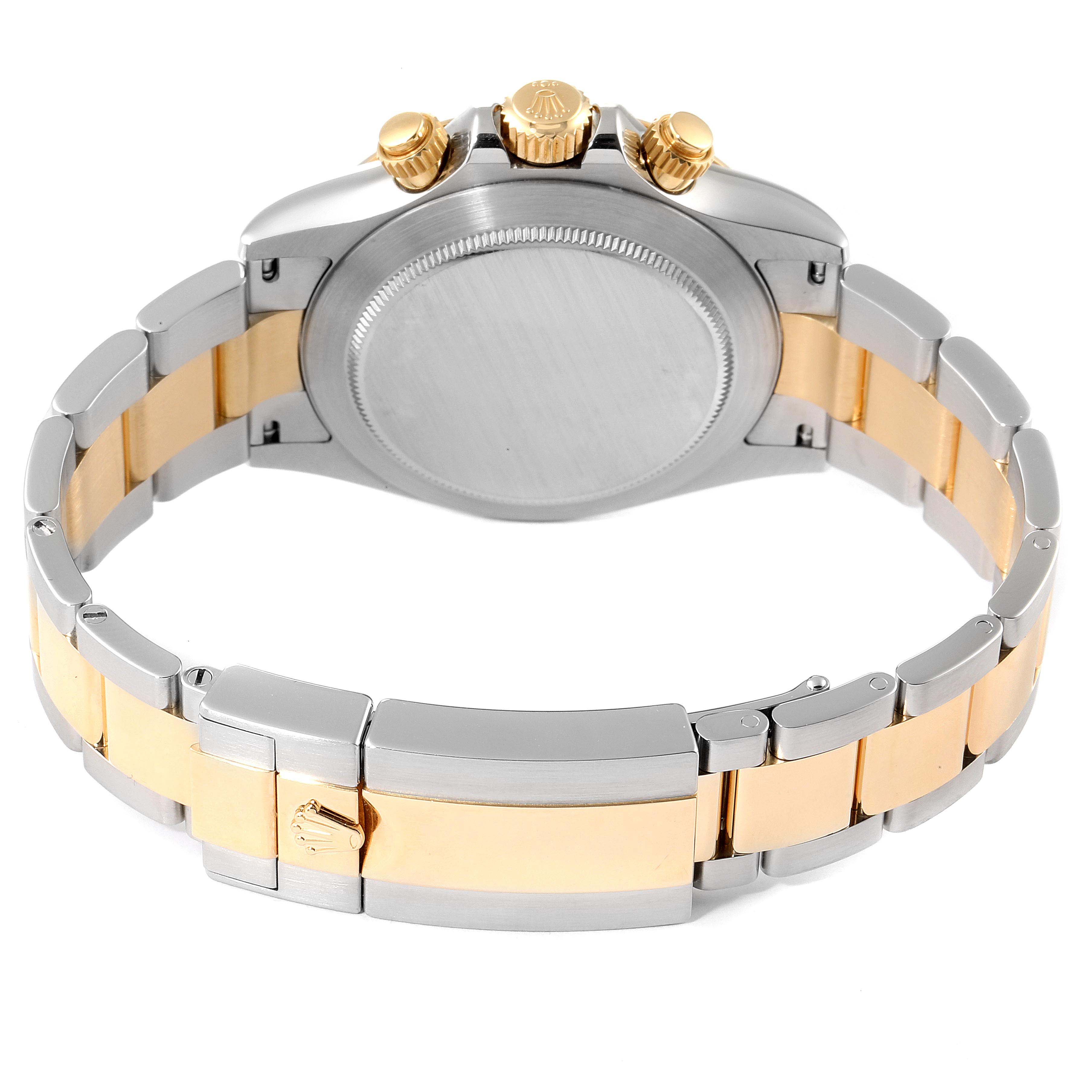 The image shows the back case and bracelet of a Rolex Daytona 116503 Men
s Steel and Gold (two tone) Black Dial 116503 Men
s Steel and Gold (two tone) Black Dial watch from a rear angle.