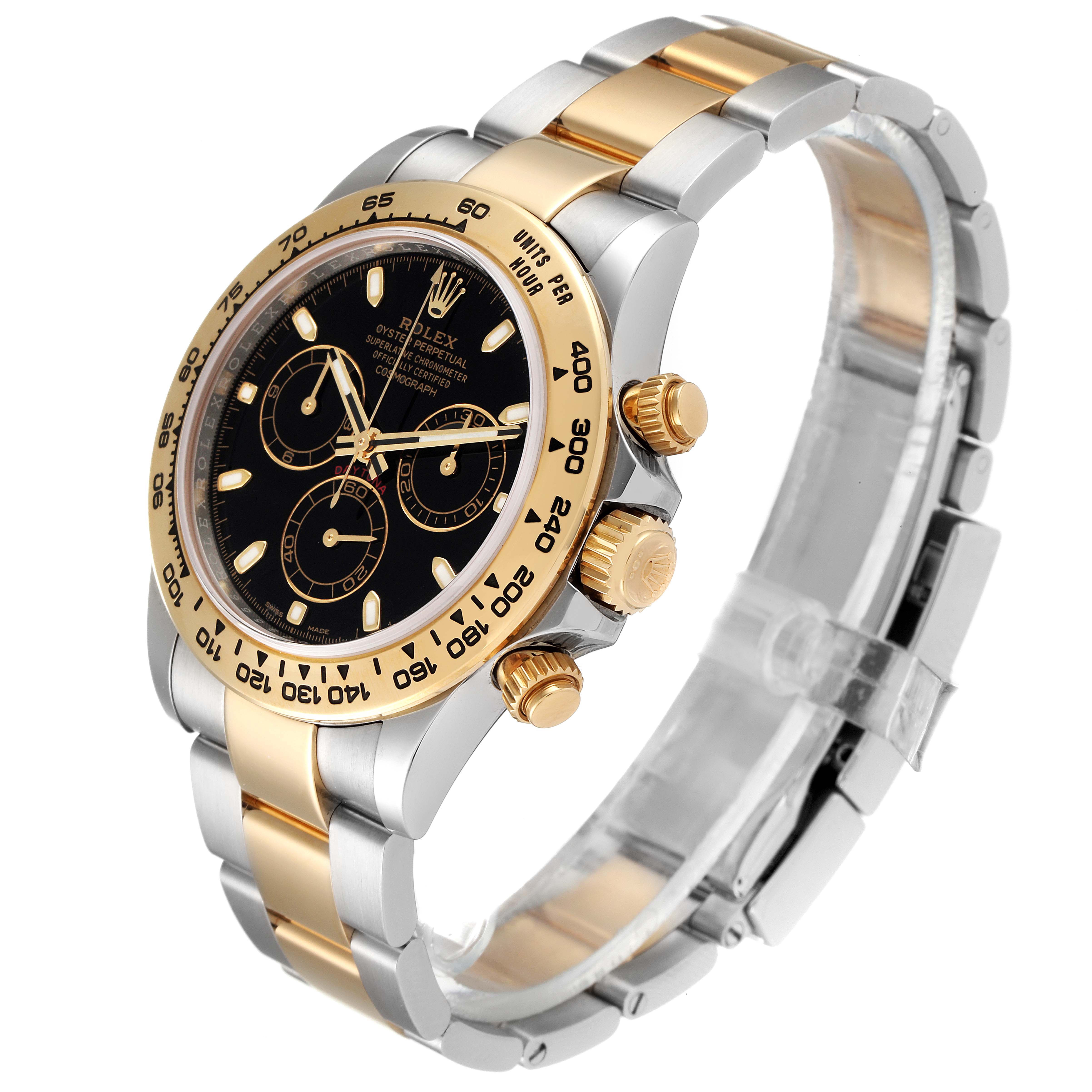 The image shows a Rolex Daytona 116503 Men
s Steel and Gold (two tone) Black Dial 116503 Men
s Steel and Gold (two tone) Black Dial watch at a three-quarter angle, highlighting its bezel, dial, and bracelet.