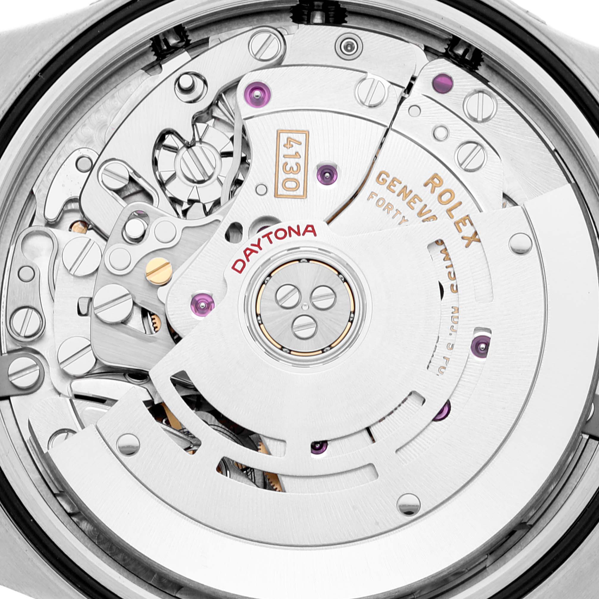 The image shows a close-up view of the movement inside a Rolex Daytona 116503 Men
s Steel and Gold (two tone) Black Dial 116503 Men
s Steel and Gold (two tone) Black Dial watch, highlighting its intricate mechanical parts.