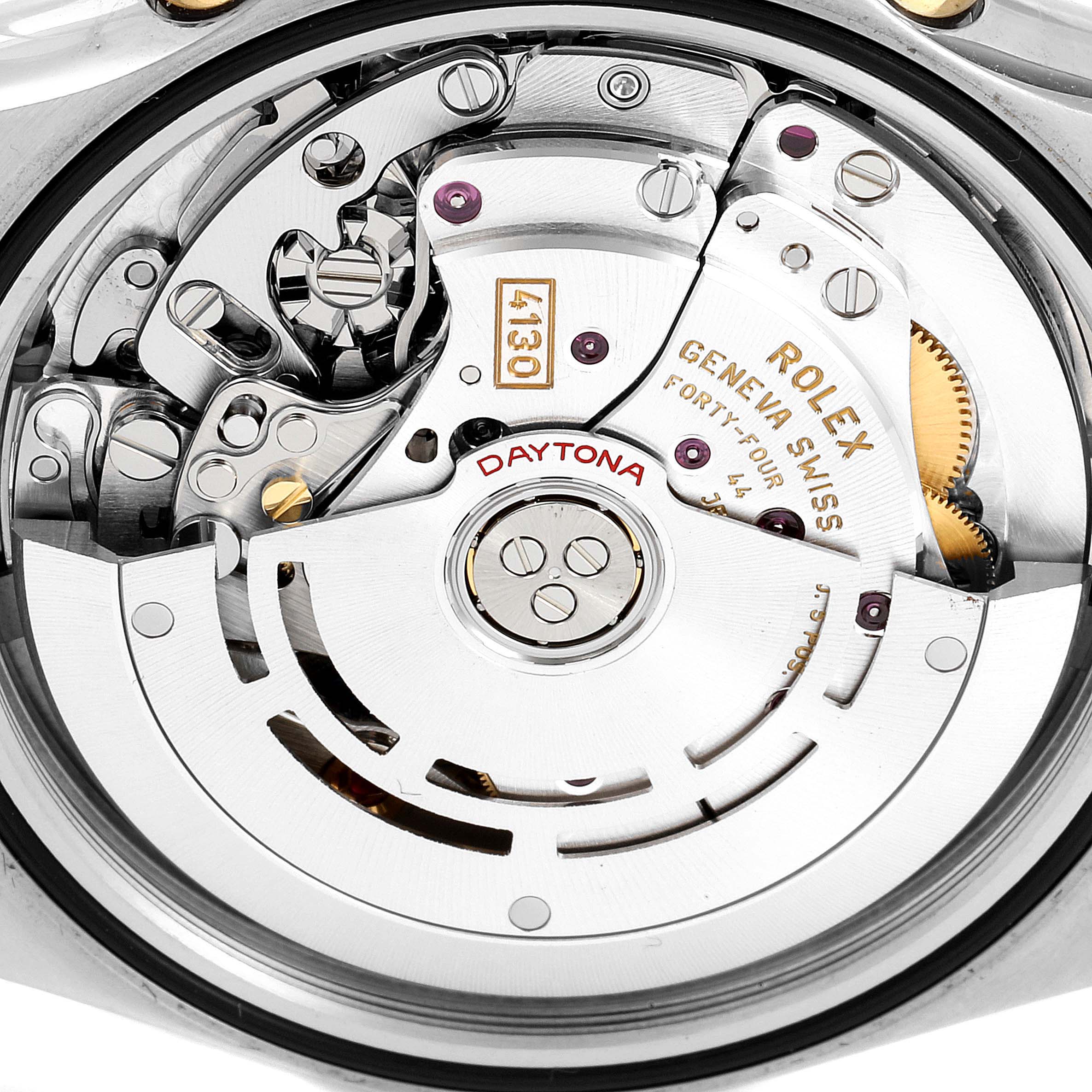 This image shows the intricate inner mechanism of a Rolex Daytona 116503 Men
s Steel and Gold (two tone) Champagne Dial 116503 Men
s Steel and Gold (two tone) Champagne Dial watch, including gears and the rotor.