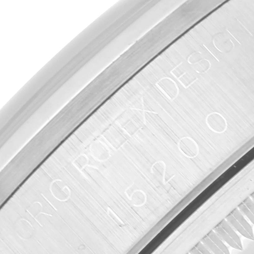 The image shows a close-up of the case back of a Rolex Date 15200 Men's Stainless Steel Blue Dial 15200 Men's Stainless Steel Blue Dial model with the model number engraved.