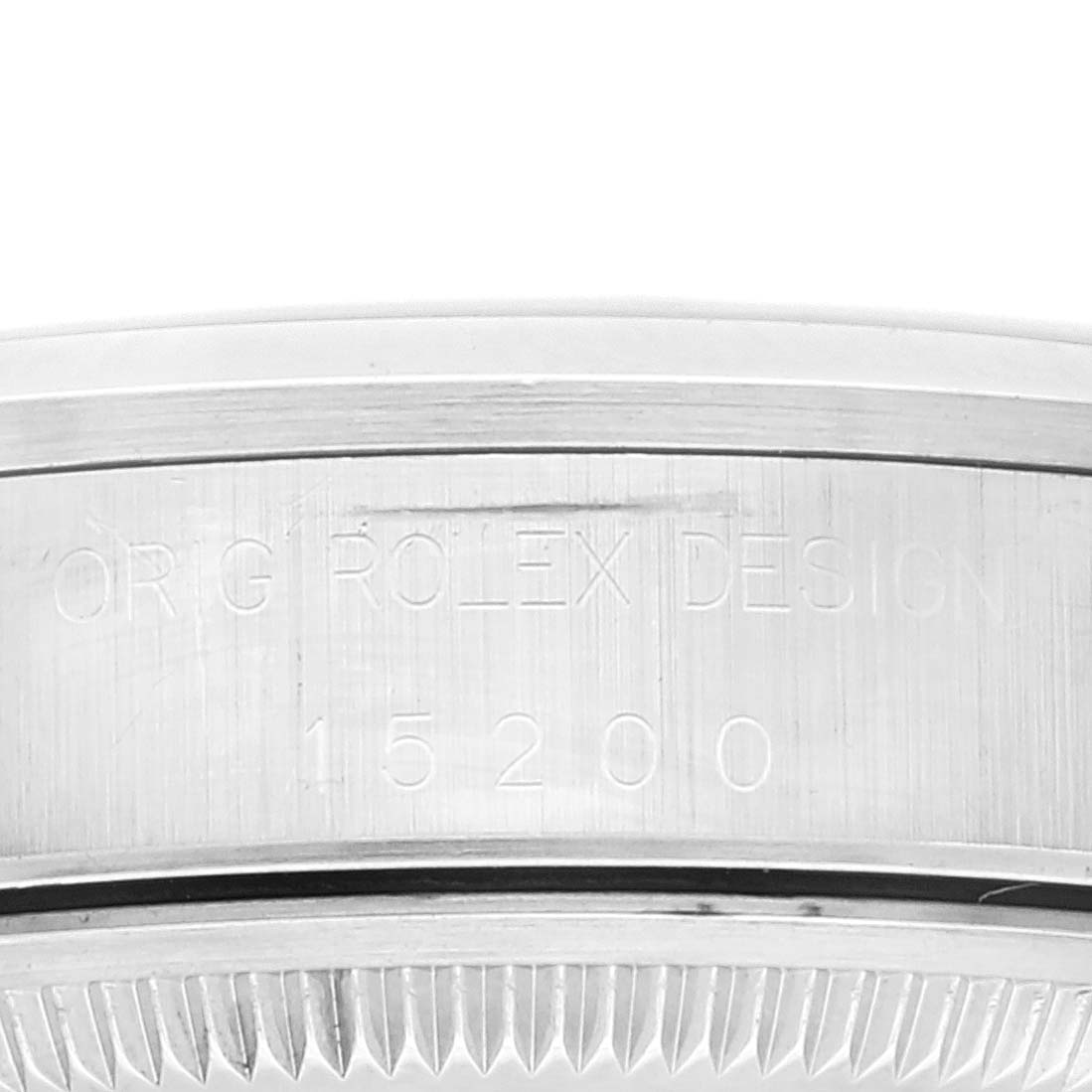 This image shows an engraved side view of the case of a Rolex Date 15200 Men's Stainless Steel Blue Dial 15200 Men's Stainless Steel Blue Dial model, displaying the model number 15200.