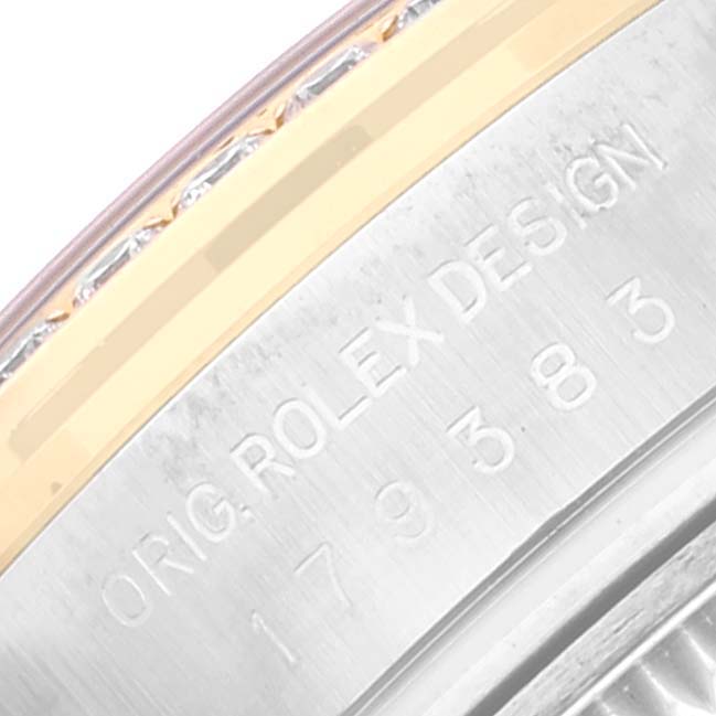 This image shows a close-up angle of the bezel and the engraved inner rim of a Rolex Datejust 179383 Women's Steel and Gold (two tone) Mother of Pearl Dial 179383 Women's Steel and Gold (two tone) Mother of Pearl Dial watch.