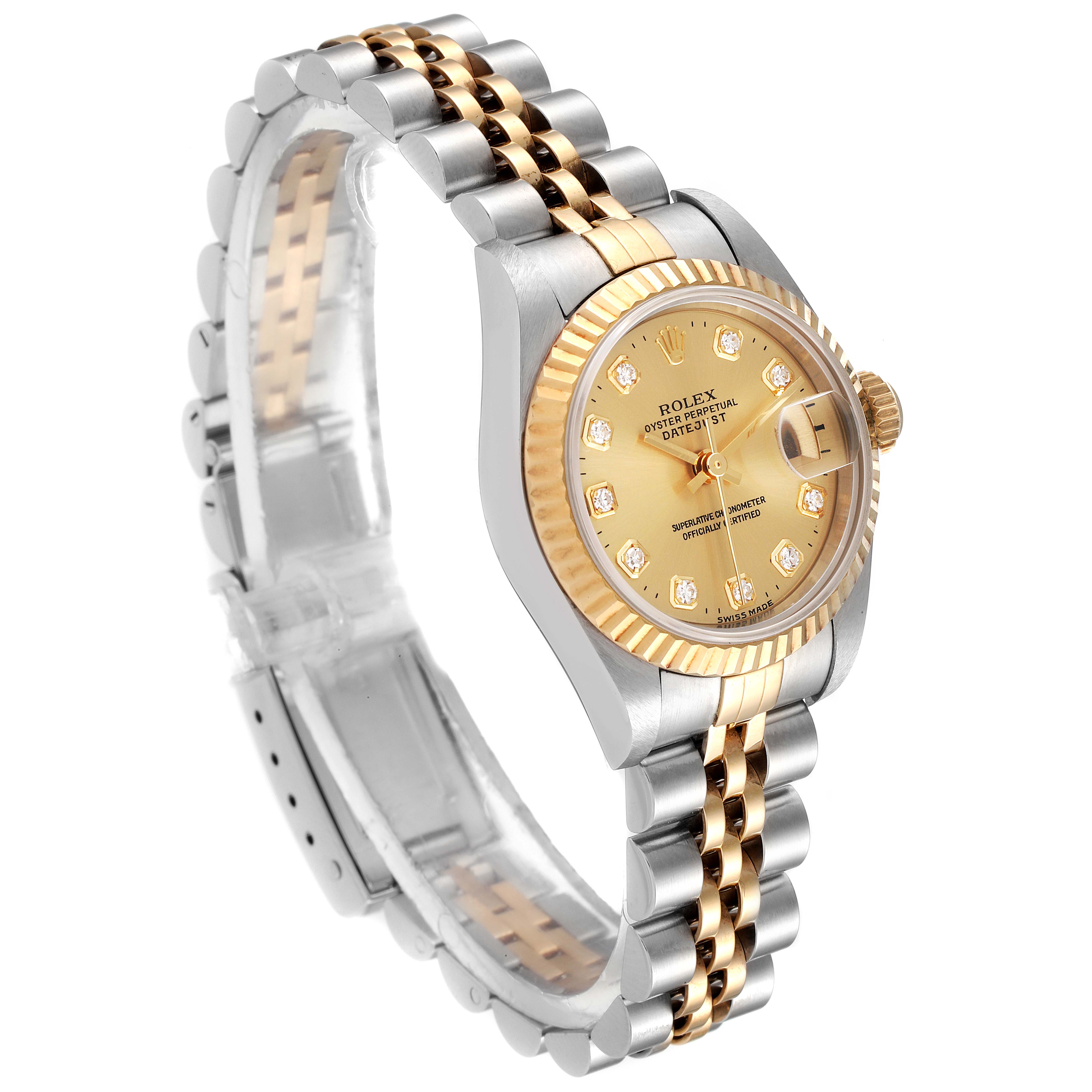 The image shows an angled view of the Rolex Datejust 69173 Women's Steel and Gold (two tone) Champagne Dial 69173 Women's Steel and Gold (two tone) Champagne Dial watch, focusing on the gold and silver bracelet and gold dial with diamond hour markers.