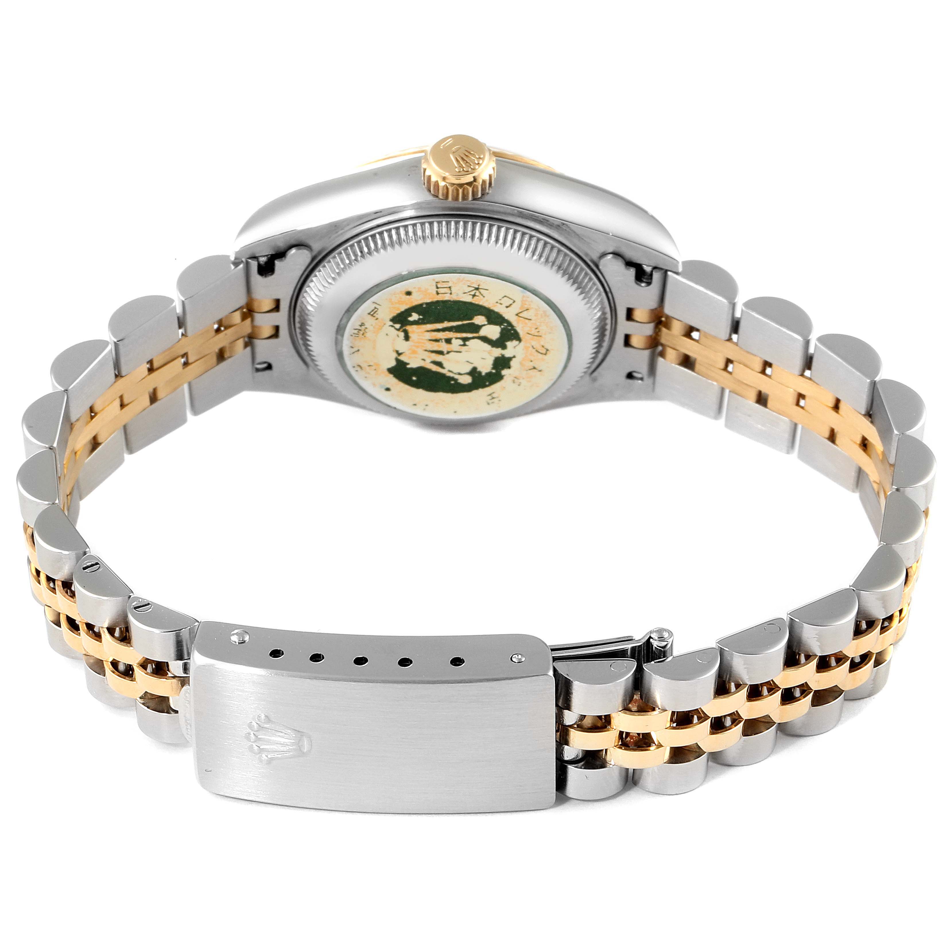 This Rolex Datejust 69173 Women's Steel and Gold (two tone) Champagne Dial 69173 Women's Steel and Gold (two tone) Champagne Dial watch is shown from the back, highlighting its caseback, two-tone bracelet, and clasp.
