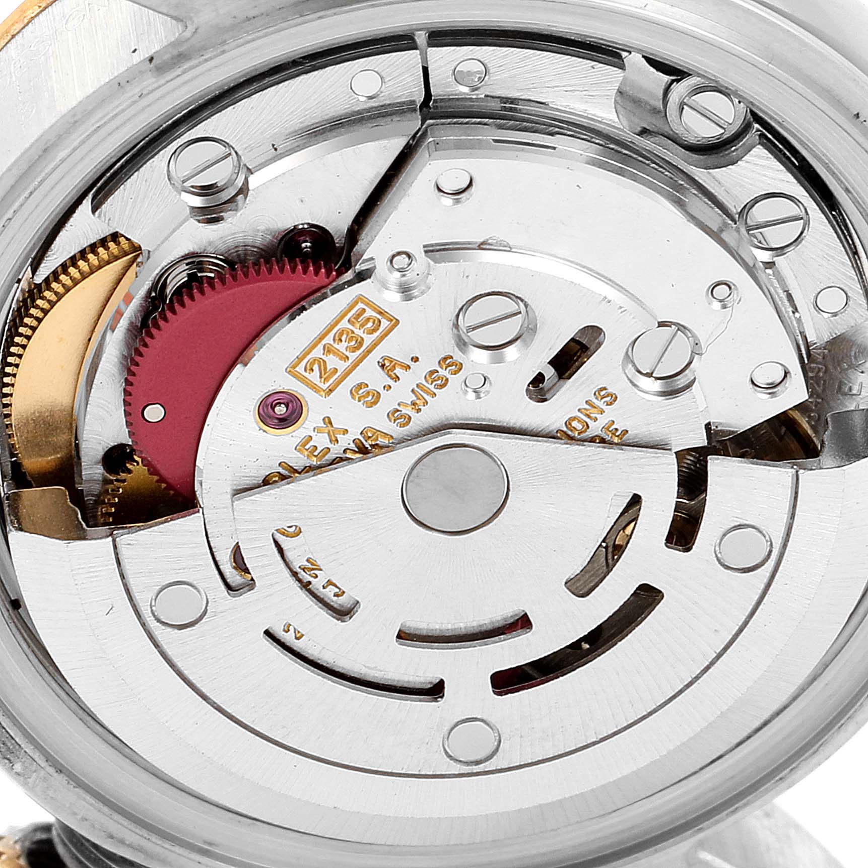 This image shows the intricate movement mechanism of a Rolex Datejust 69173 Women's Steel and Gold (two tone) Champagne Dial 69173 Women's Steel and Gold (two tone) Champagne Dial watch from a close-up angle.