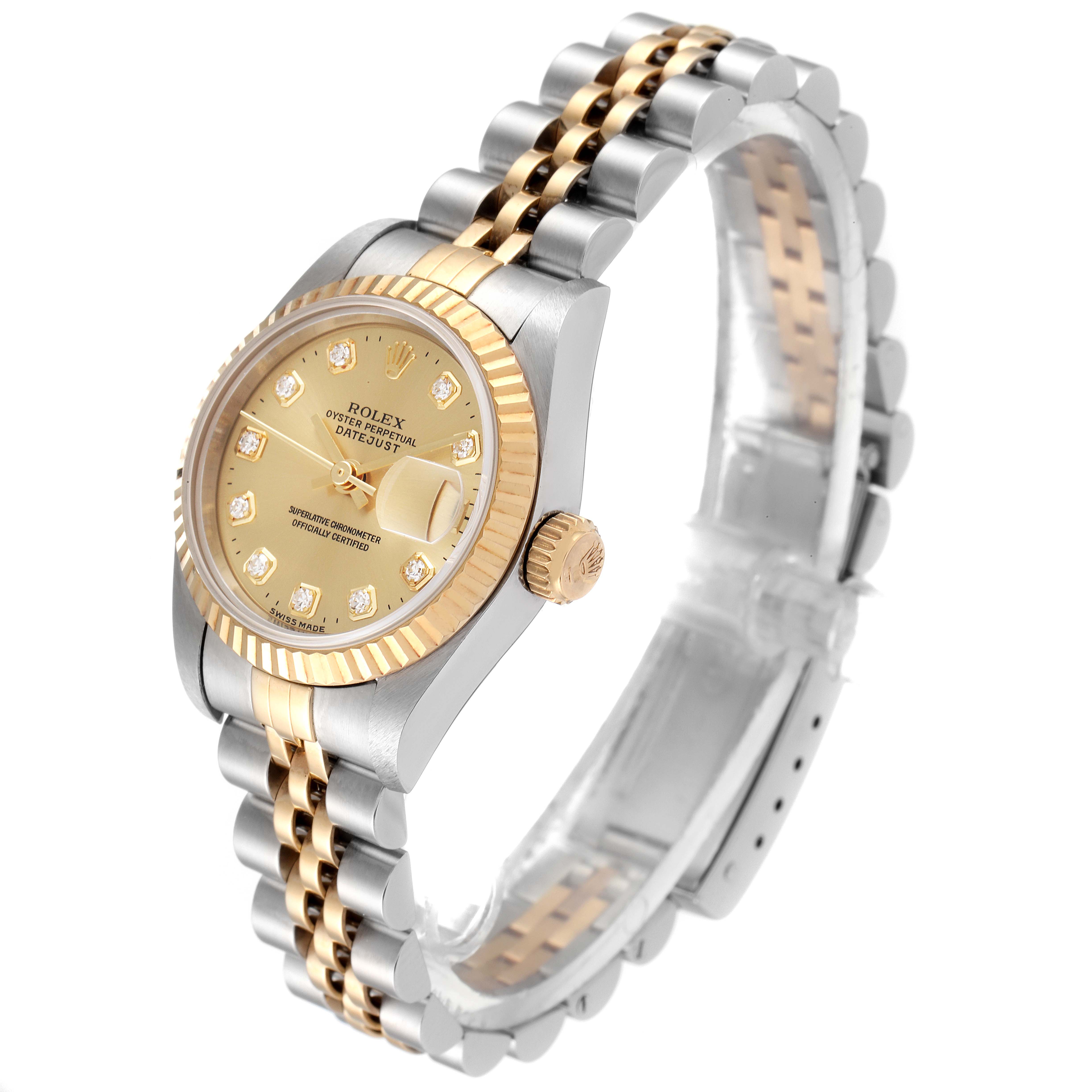 The image shows a Rolex Datejust 69173 Women's Steel and Gold (two tone) Champagne Dial 69173 Women's Steel and Gold (two tone) Champagne Dial watch at a side angle, highlighting its gold dial, bezel, and two-tone bracelet.