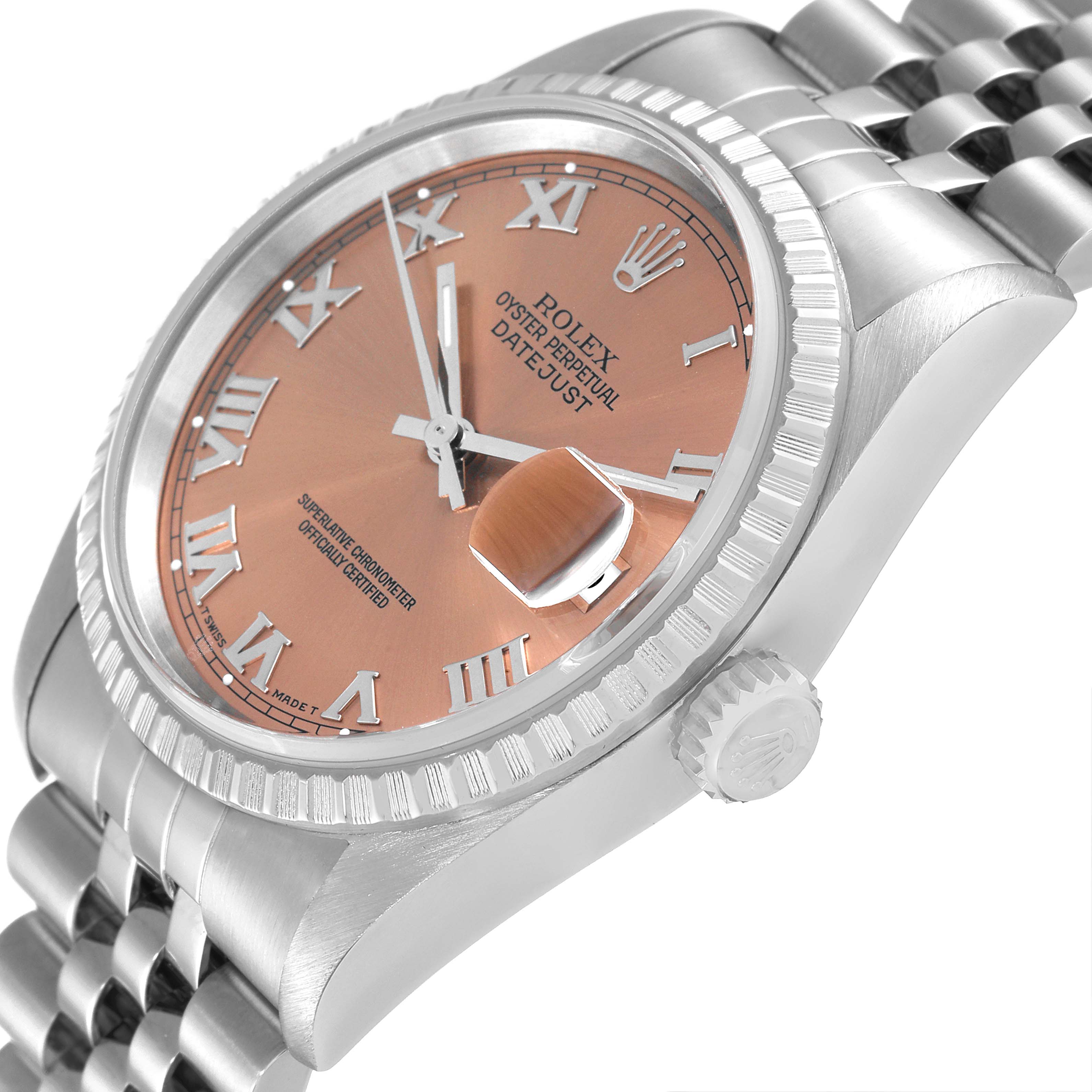 The image shows a close-up angled view of a Rolex Datejust 16220 Men's Stainless Steel Pink Dial 16220 Men's Stainless Steel Pink Dial watch, highlighting its dial, bezel, crown, and bracelet.
