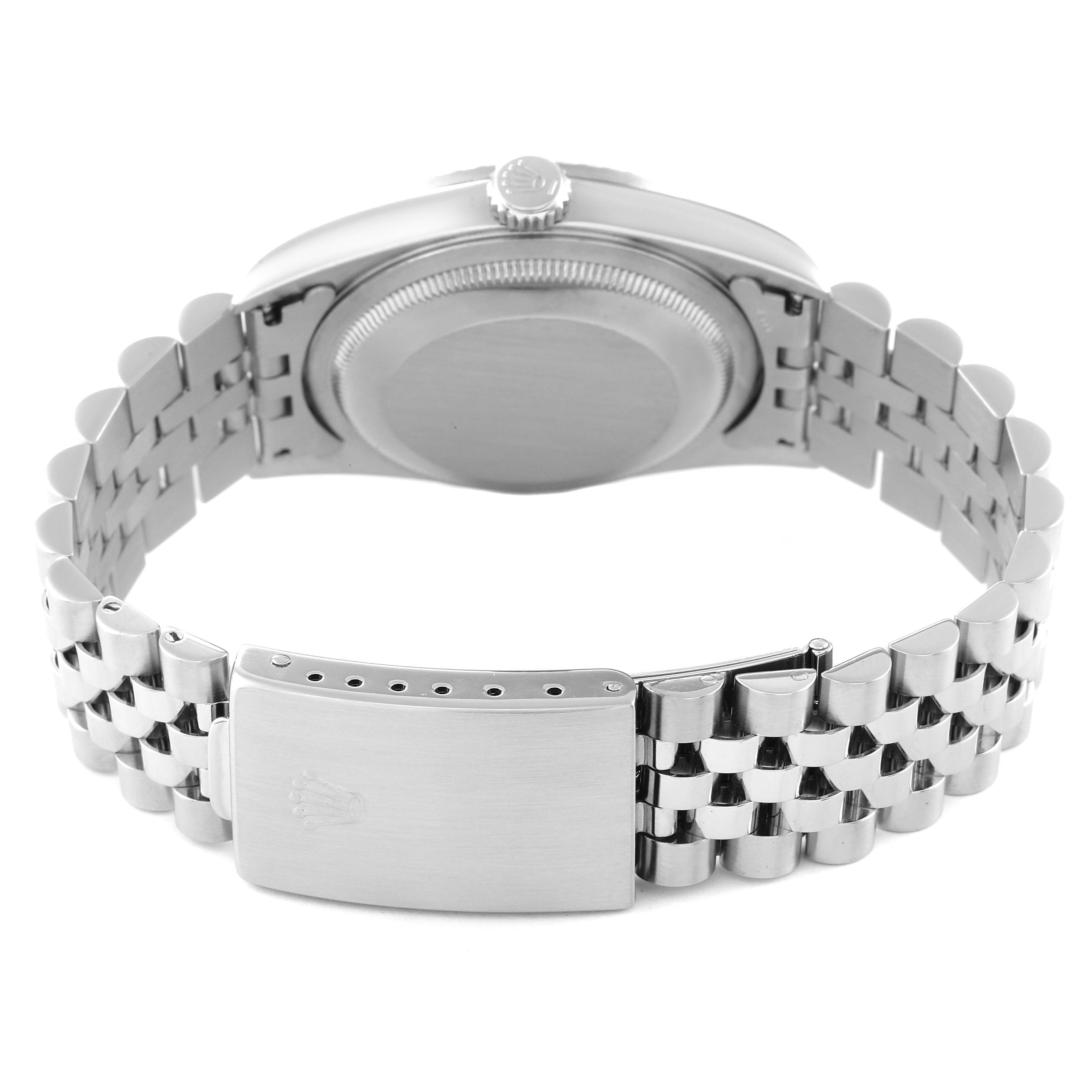 The image shows the backside and clasp of a Rolex Datejust 16220 Men's Stainless Steel Pink Dial 16220 Men's Stainless Steel Pink Dial watch, highlighting the bracelet and case back.