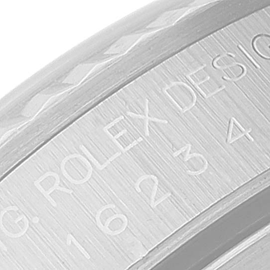 This close-up angle shows the engraved inner bezel of a Rolex Datejust 16234 Men's Stainless Steel Black Dial 16234 Men's Stainless Steel Black Dial watch.