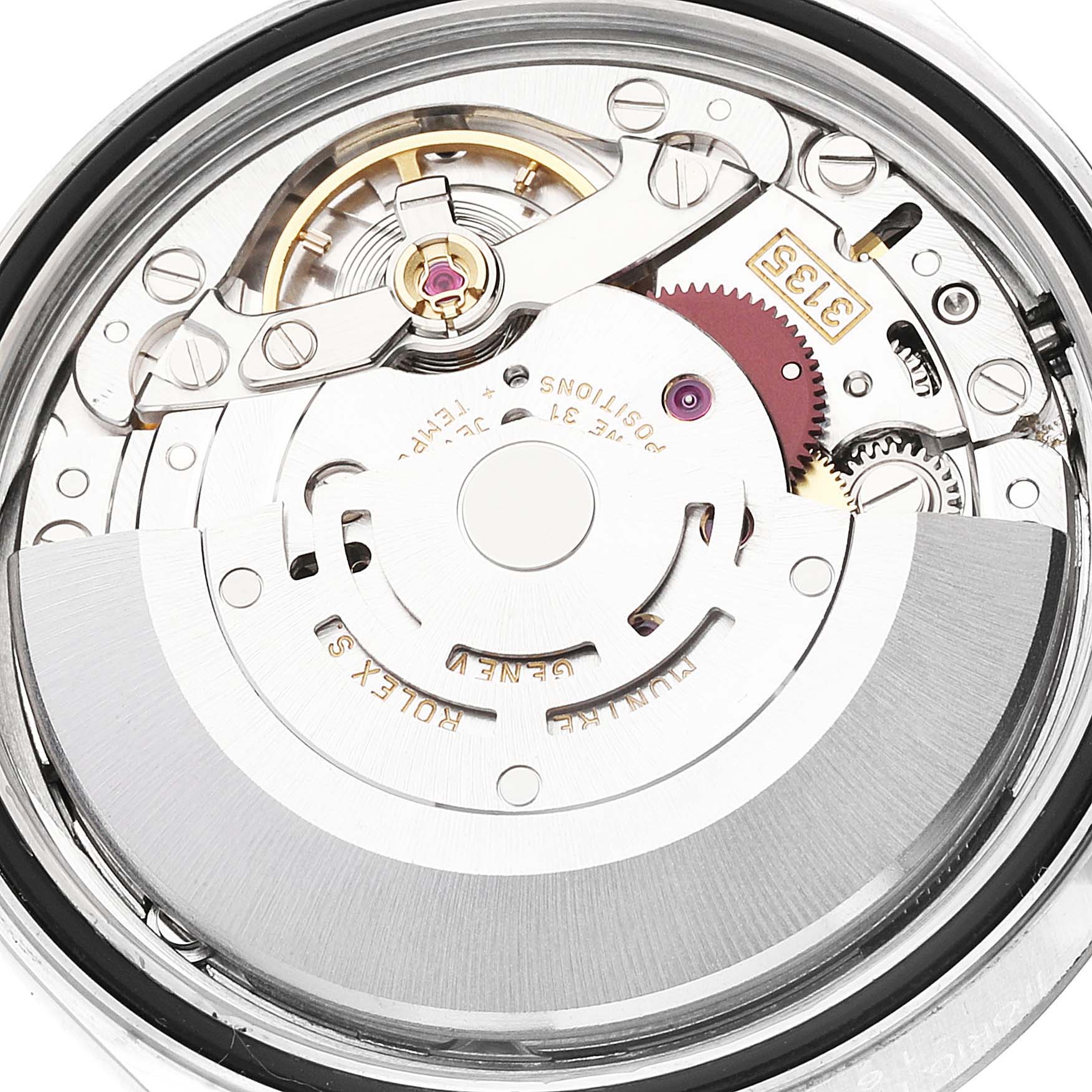 The image shows a close-up of the movement mechanism of a Rolex Datejust 16234 Men's Stainless Steel Blue Dial 16234 Men's Stainless Steel Blue Dial watch, highlighting gears and intricate components.