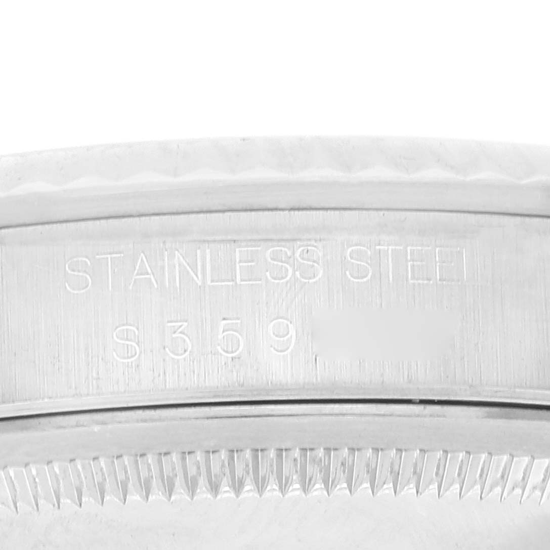 This image shows a close-up of the stainless steel case back and model number engraving of a Rolex Datejust 16234 Men's Stainless Steel Silver Dial 16234 Men's Stainless Steel Silver Dial watch.