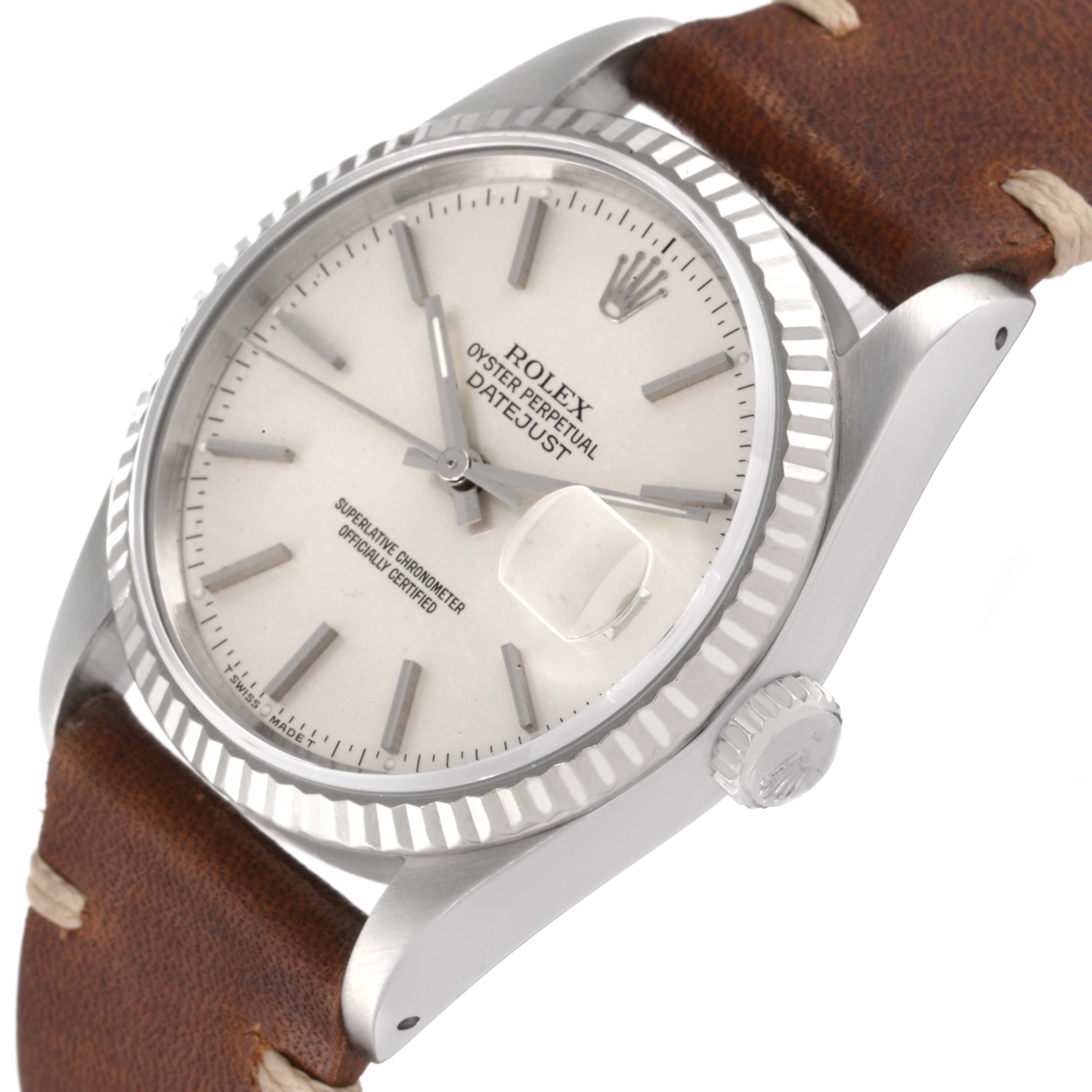 The image shows a Rolex Datejust 16234 Men's Stainless Steel Silver Dial 16234 Men's Stainless Steel Silver Dial watch at an angled view, displaying the dial, crown, and part of the leather strap.