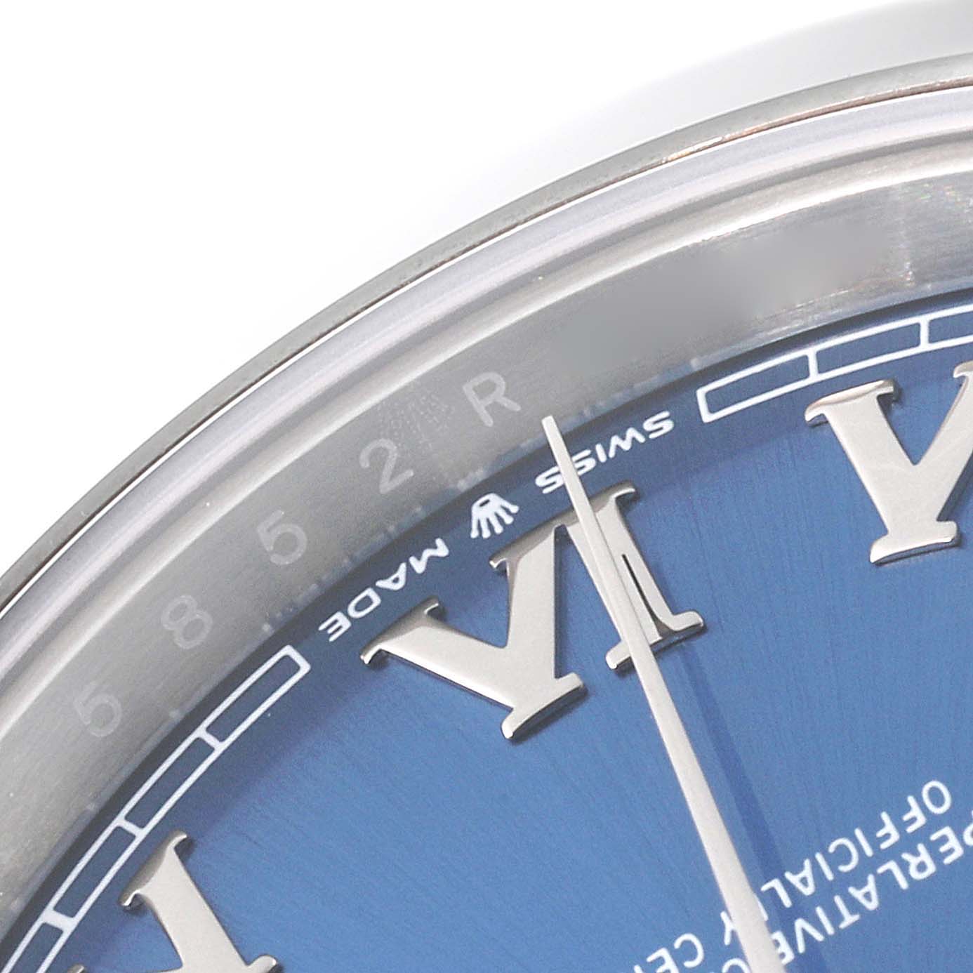 This image shows a close-up of the dial and inner bezel of the Rolex Datejust 41 126300 Men's Stainless Steel Blue Dial 126300 Men's Stainless Steel Blue Dial watch, highlighting the Roman numeral markers.