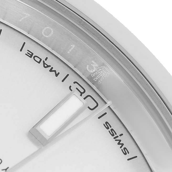 The image shows a close-up of a Rolex Datejust 41 126300 Men's Stainless Steel Grey Dial watch, focusing on the dial, date window, and part of the bezel.