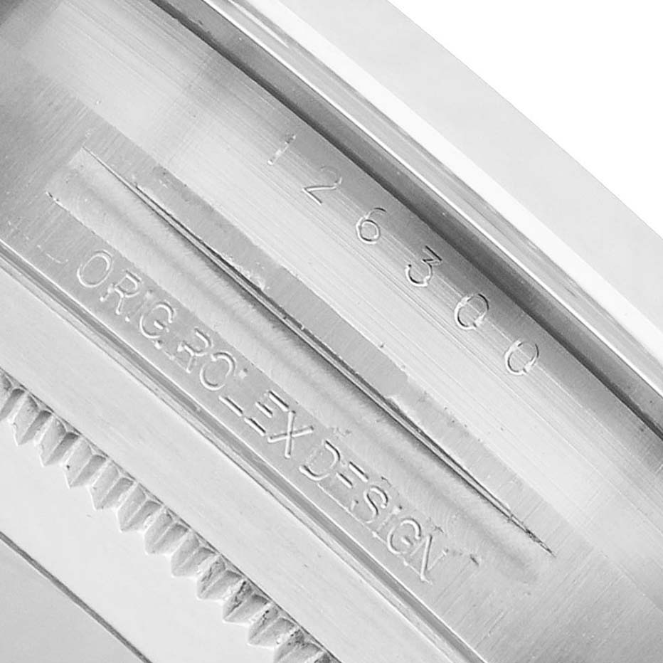 The image shows a close-up of the Rolex Datejust 41 126300 Men's Stainless Steel Grey Dial's inner bezel with engraved details.