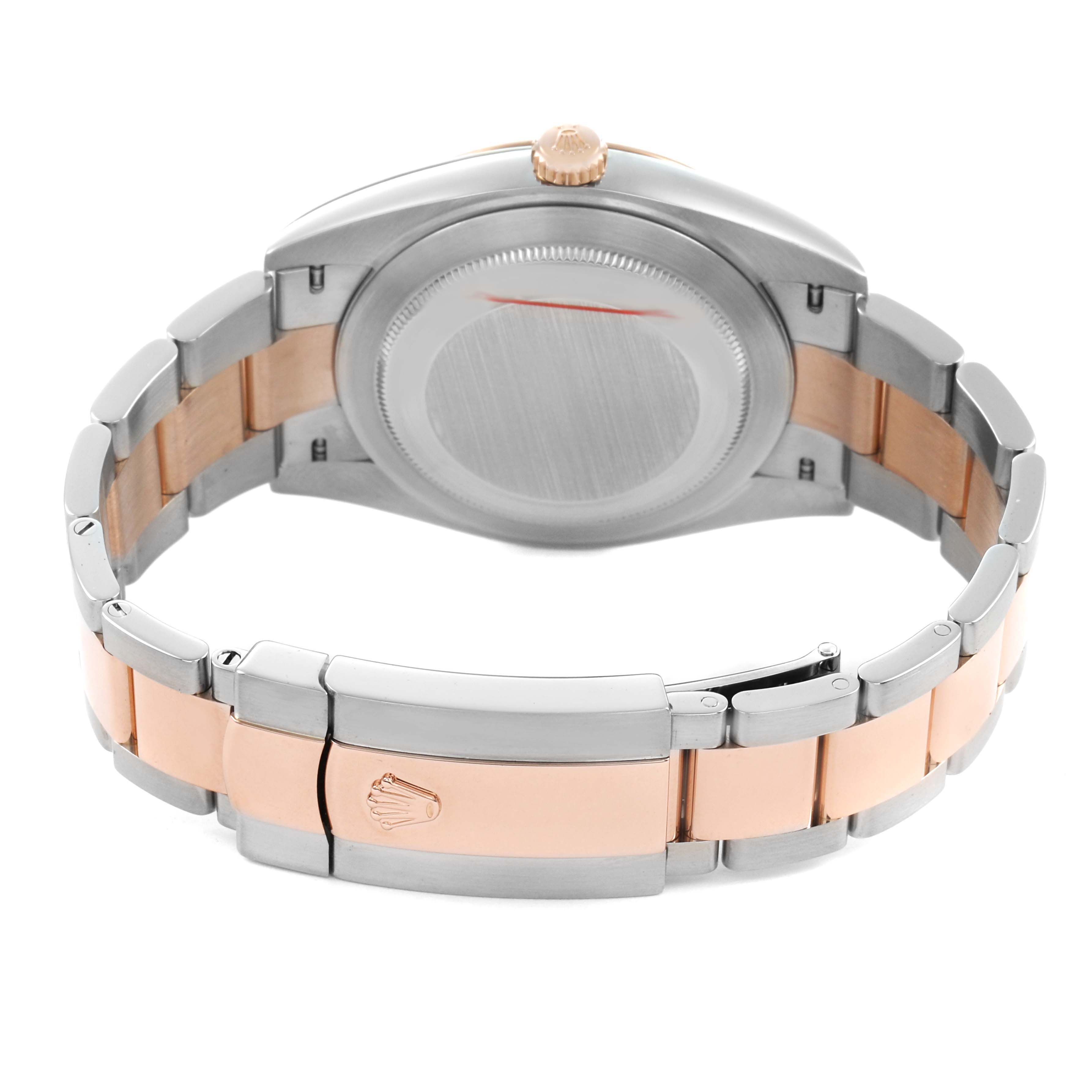 The image shows the back view of a Rolex Datejust 41 126331 Men's Steel and Gold (two tone) Brown Dial with its case back, crown, and two-tone bracelet fully visible.