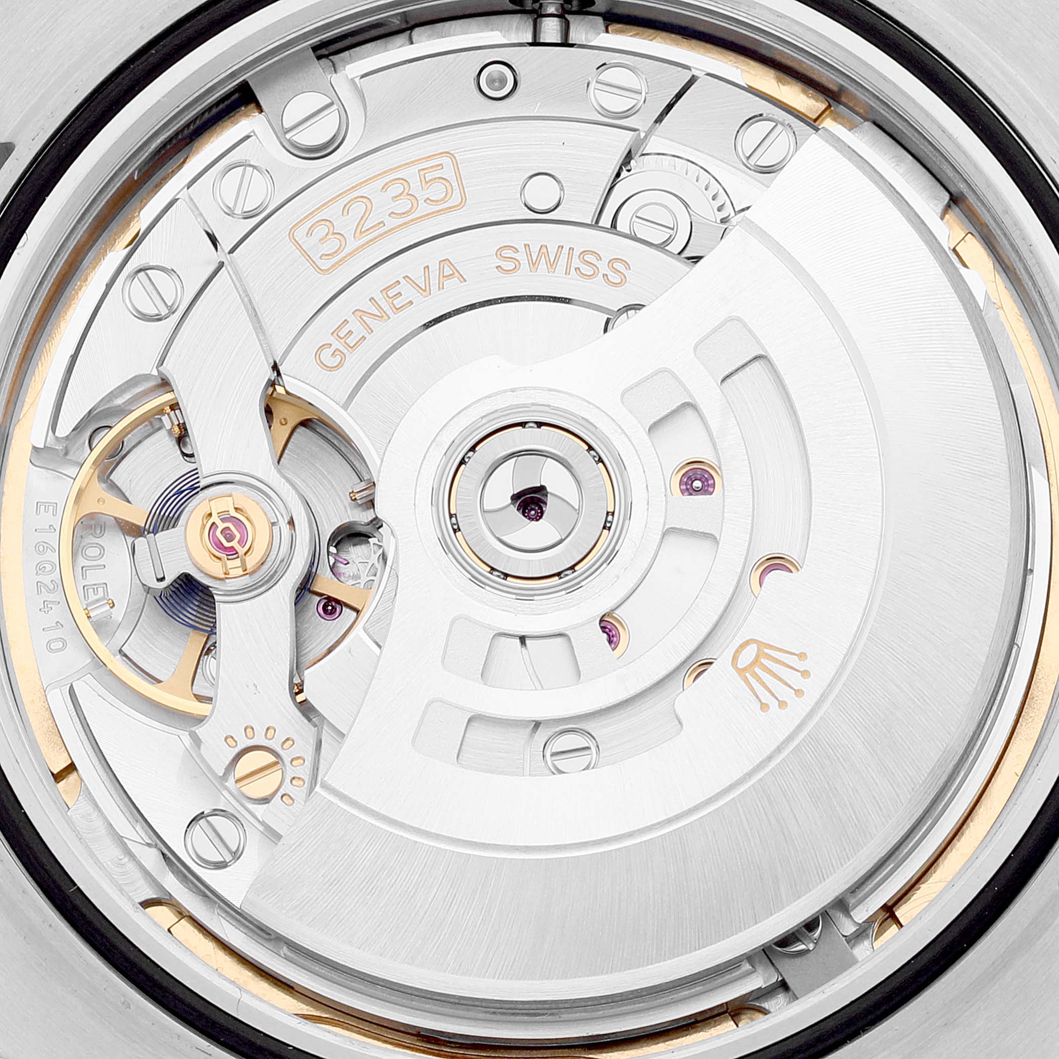 This image shows a close-up of the Rolex Datejust 41 126334 Men's Stainless Steel Blue Dial 126334 Men's Stainless Steel Blue Dial movement, highlighting the intricate inner workings and the "3235" label.