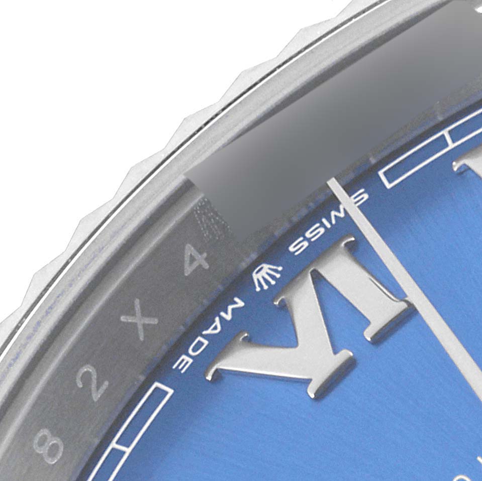 This close-up image shows the bezel, part of the dial, and Roman numeral markers of the Rolex Datejust 41 126334 Men's Stainless Steel Blue Dial 126334 Men's Stainless Steel Blue Dial watch.
