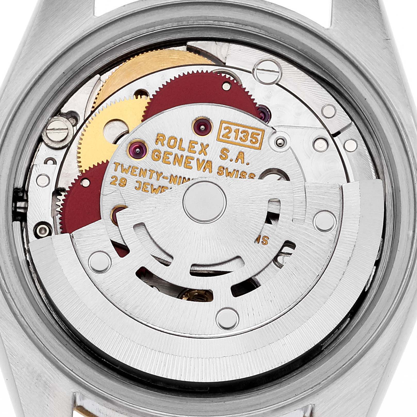 This image shows the inner movement mechanism of a Rolex Datejust 69173 Women's Steel and Gold (two tone) Black Dial 69173 Women's Steel and Gold (two tone) Black Dial watch, highlighting the gears and rotor.