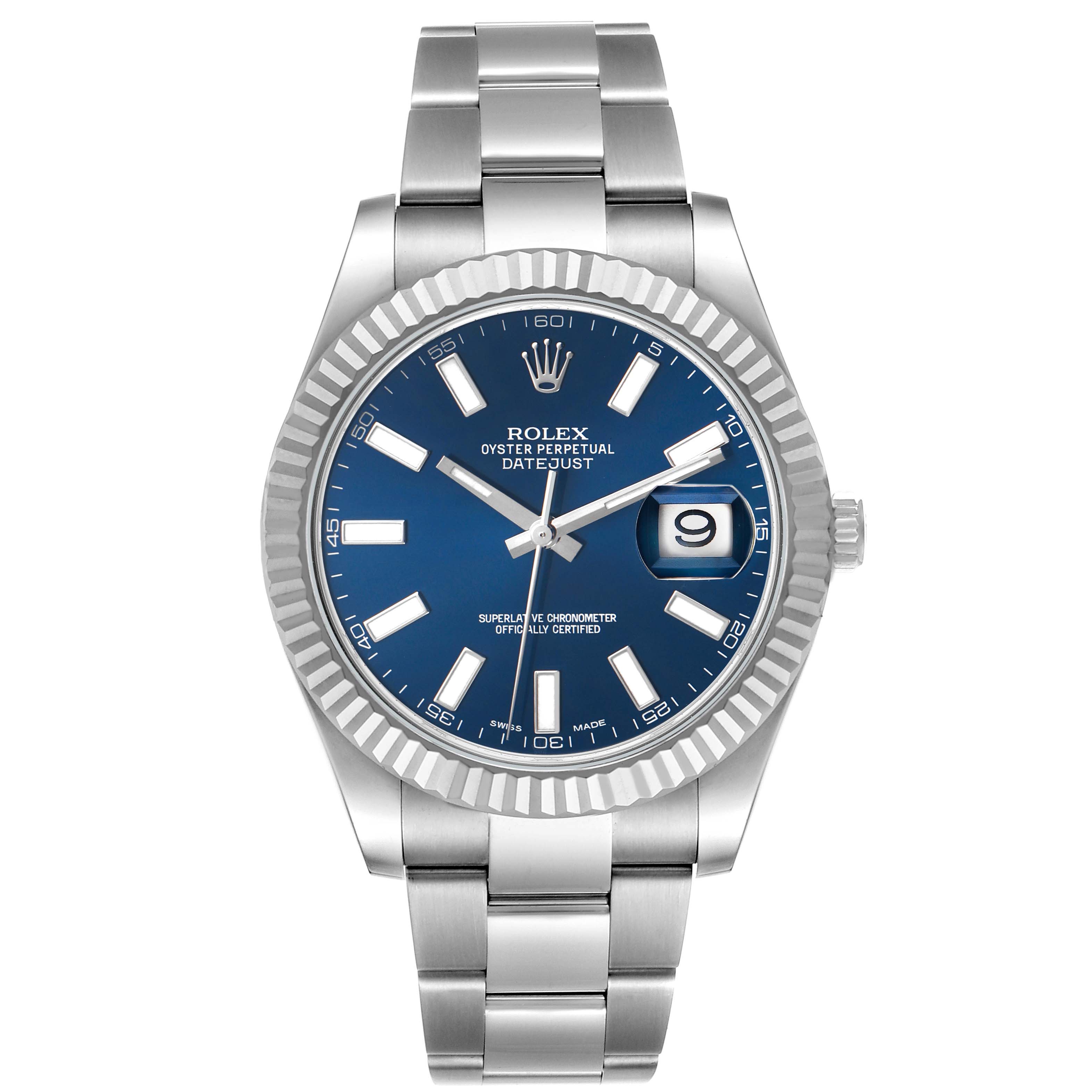 The image shows a front view of a Rolex Datejust 116334 Men's Stainless Steel Blue Dial watch, highlighting its blue dial, fluted bezel, and stainless steel bracelet.
